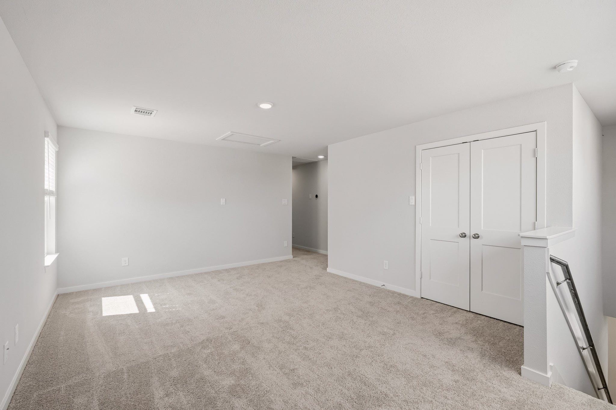A room with white doors.