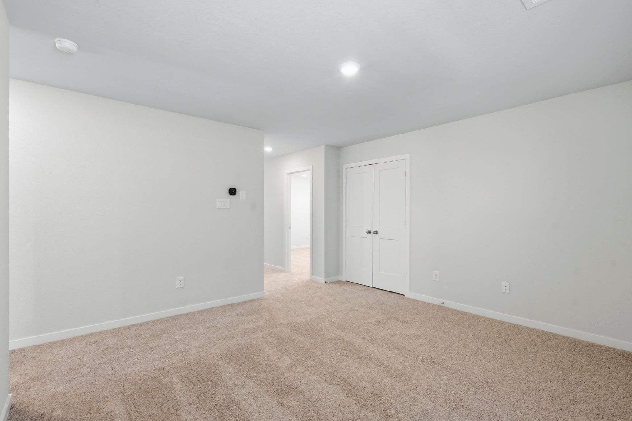 A room with white doors.