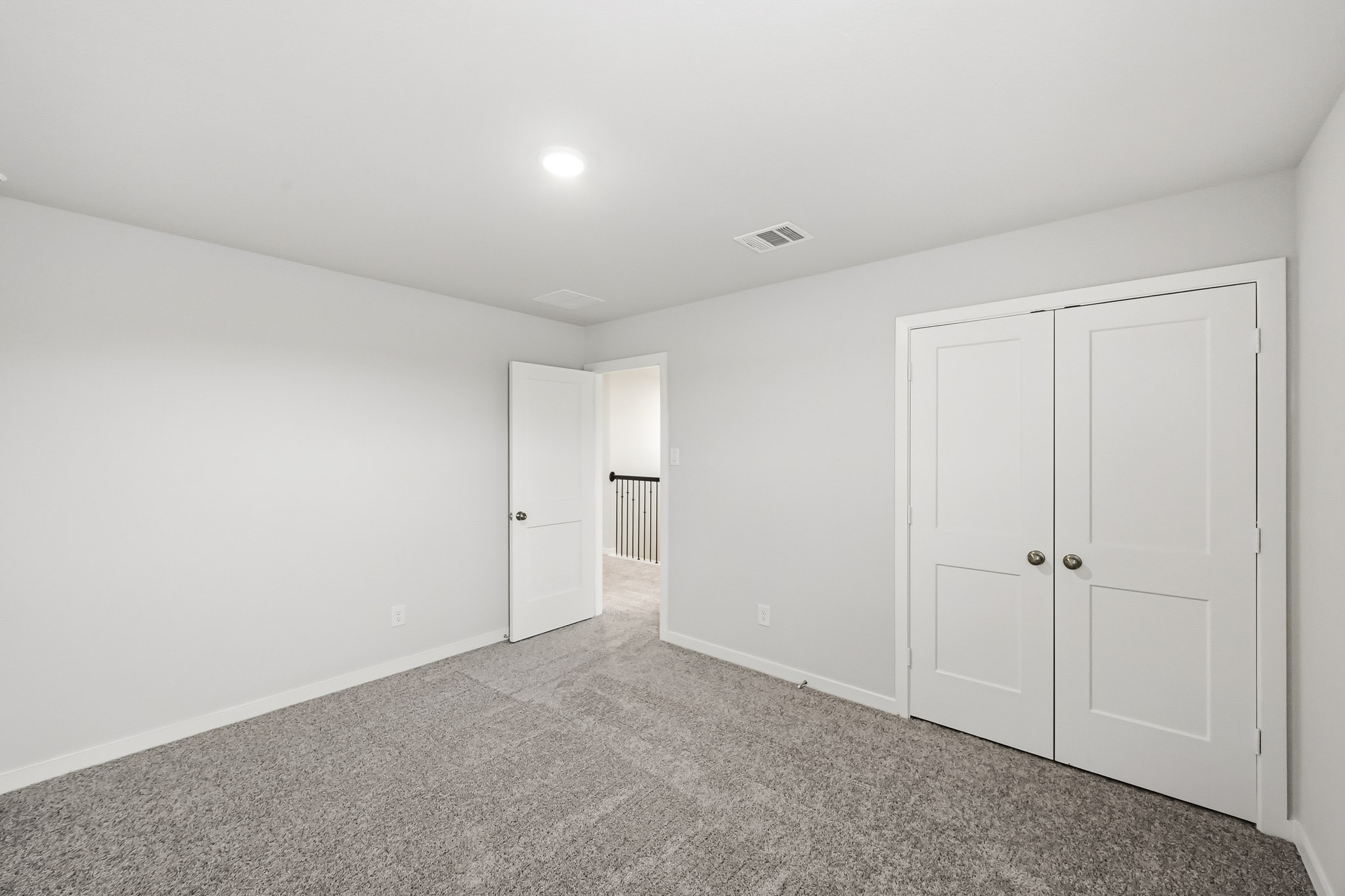 A room with white doors.