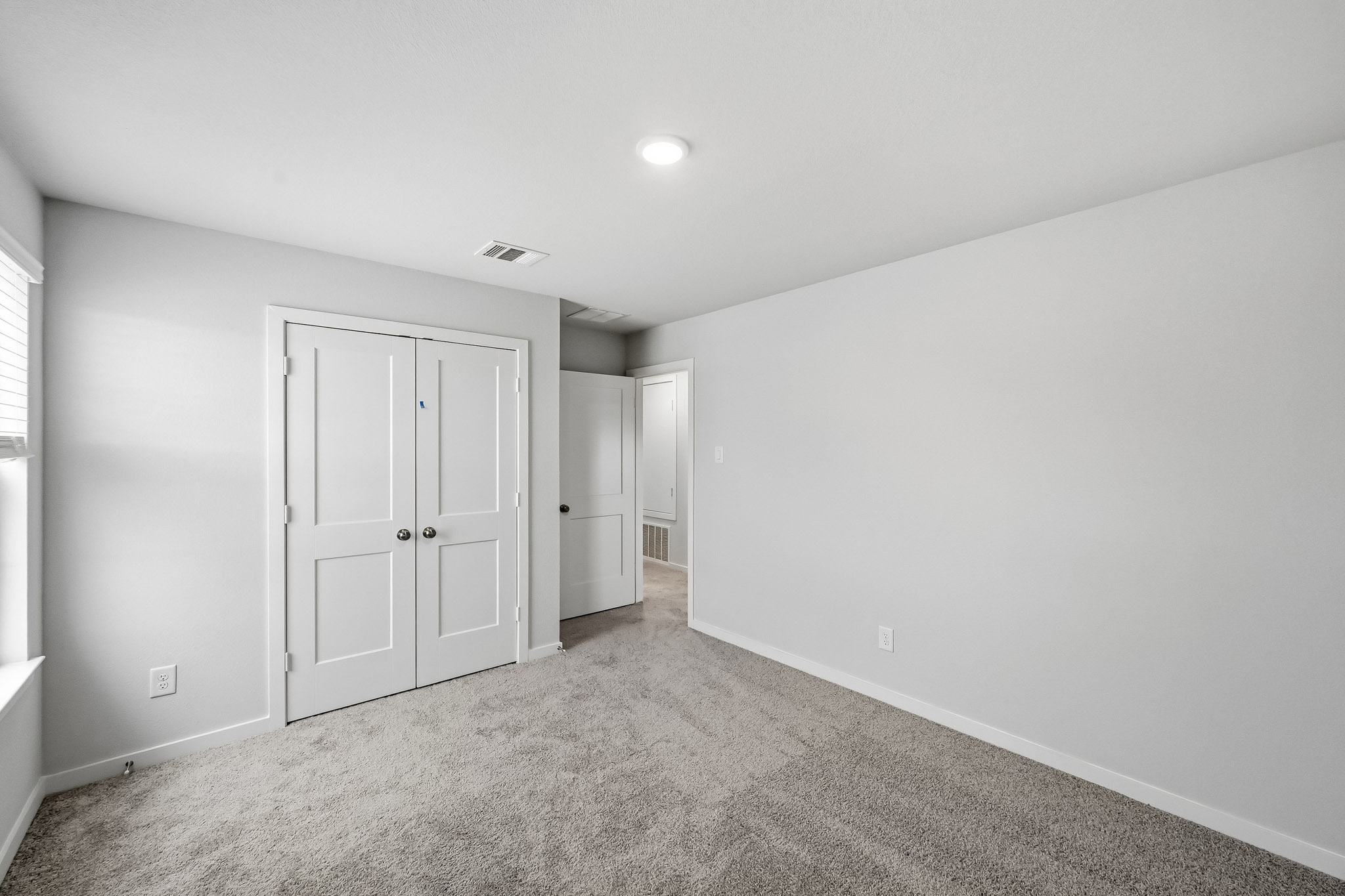 A room with white doors.