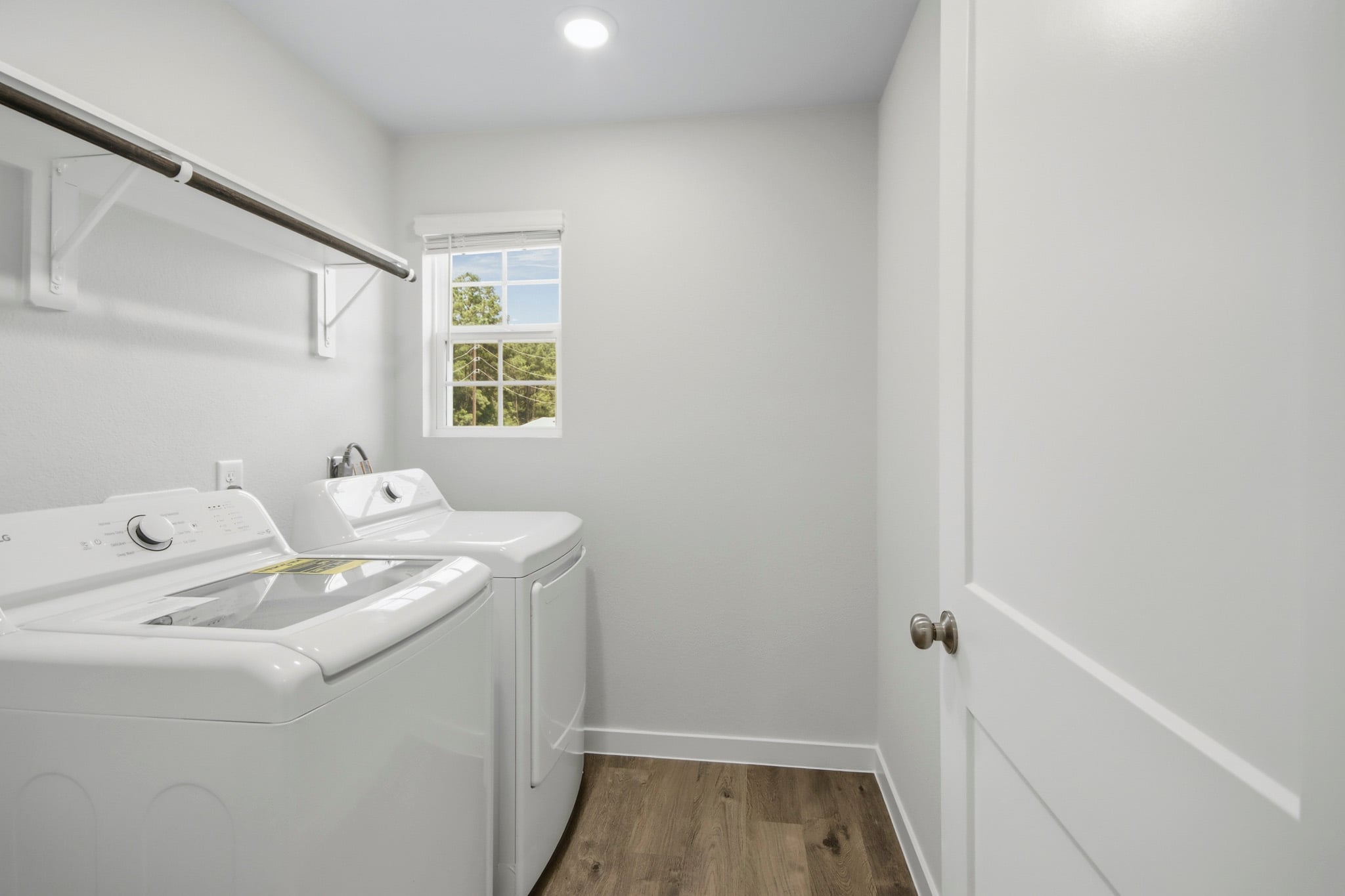 A bathroom with a tub and sink.