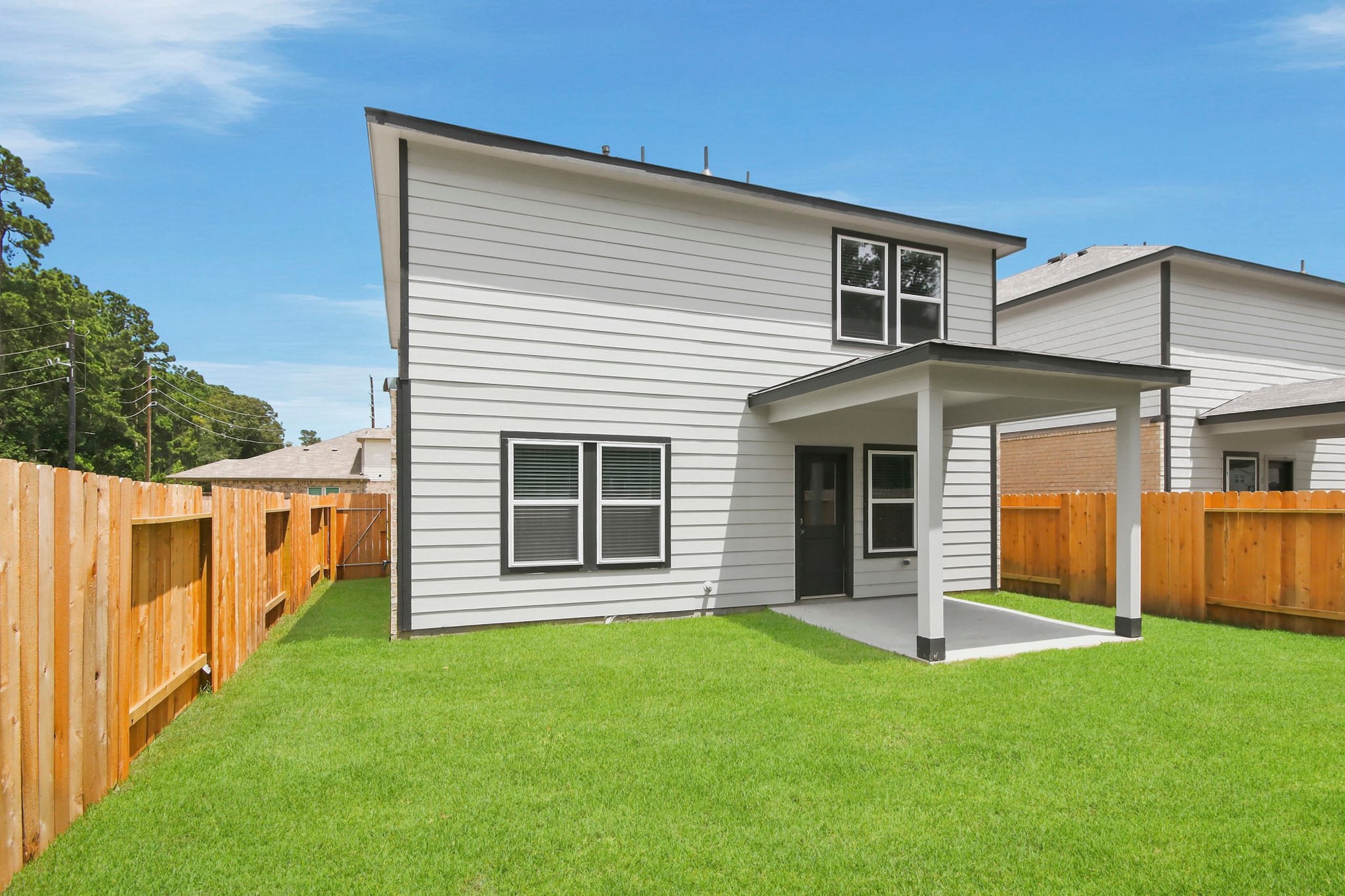 A house with a fence around it.
