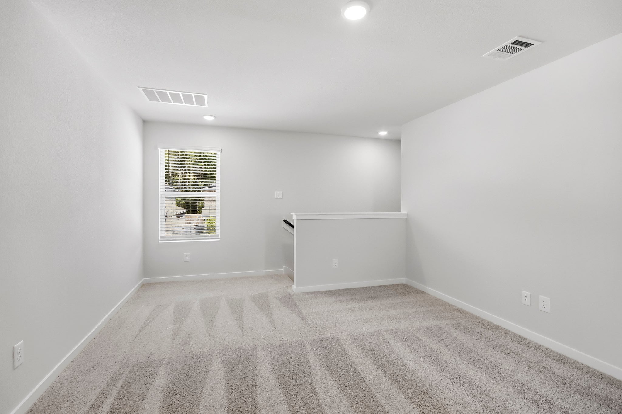 A room with a sign on the wall.