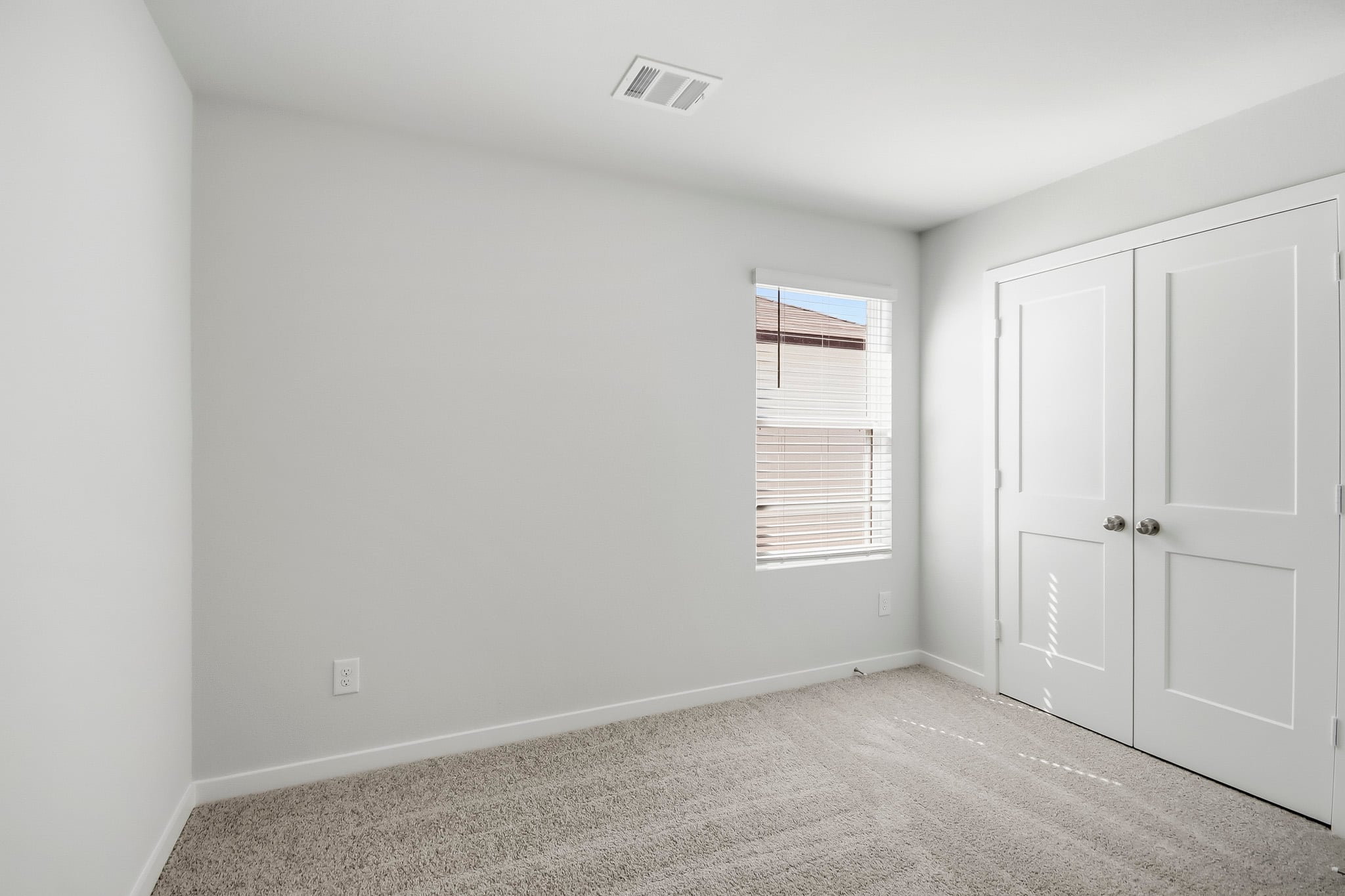 A room with white doors.