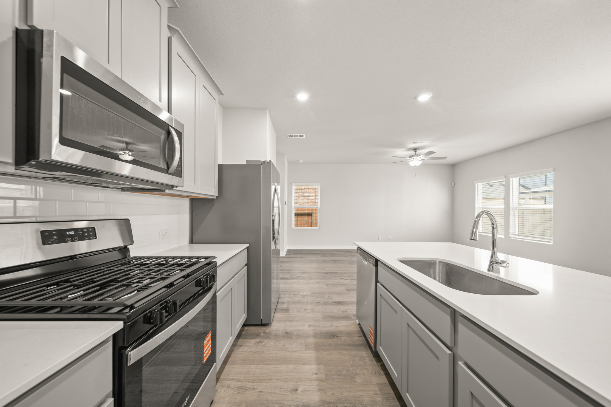 A kitchen with stainless steel appliances.
