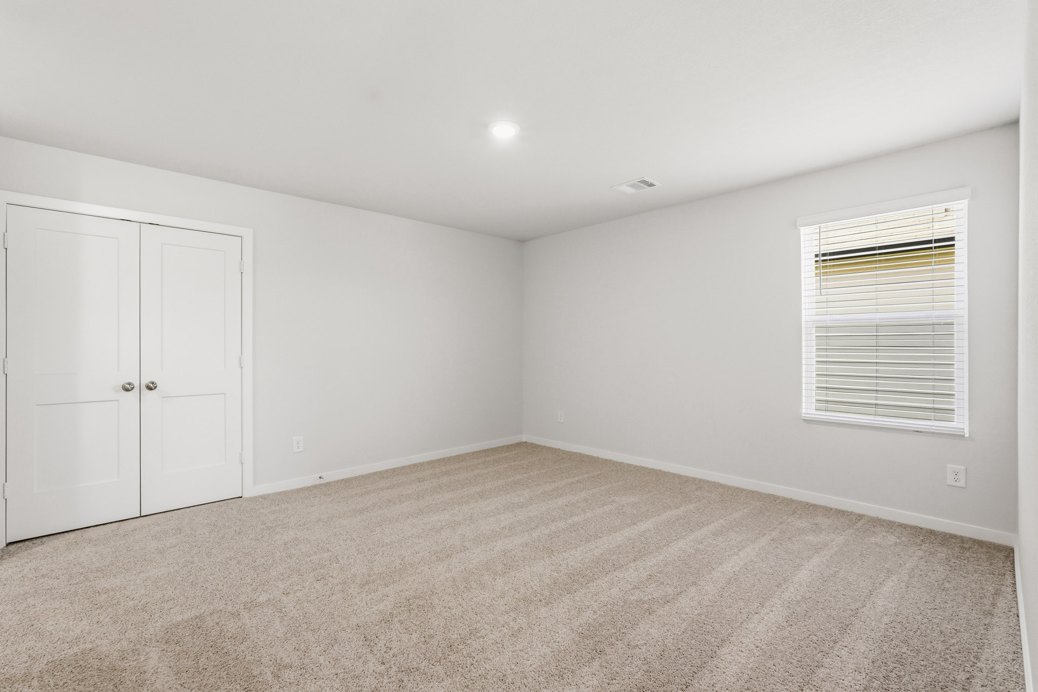 A room with white doors.