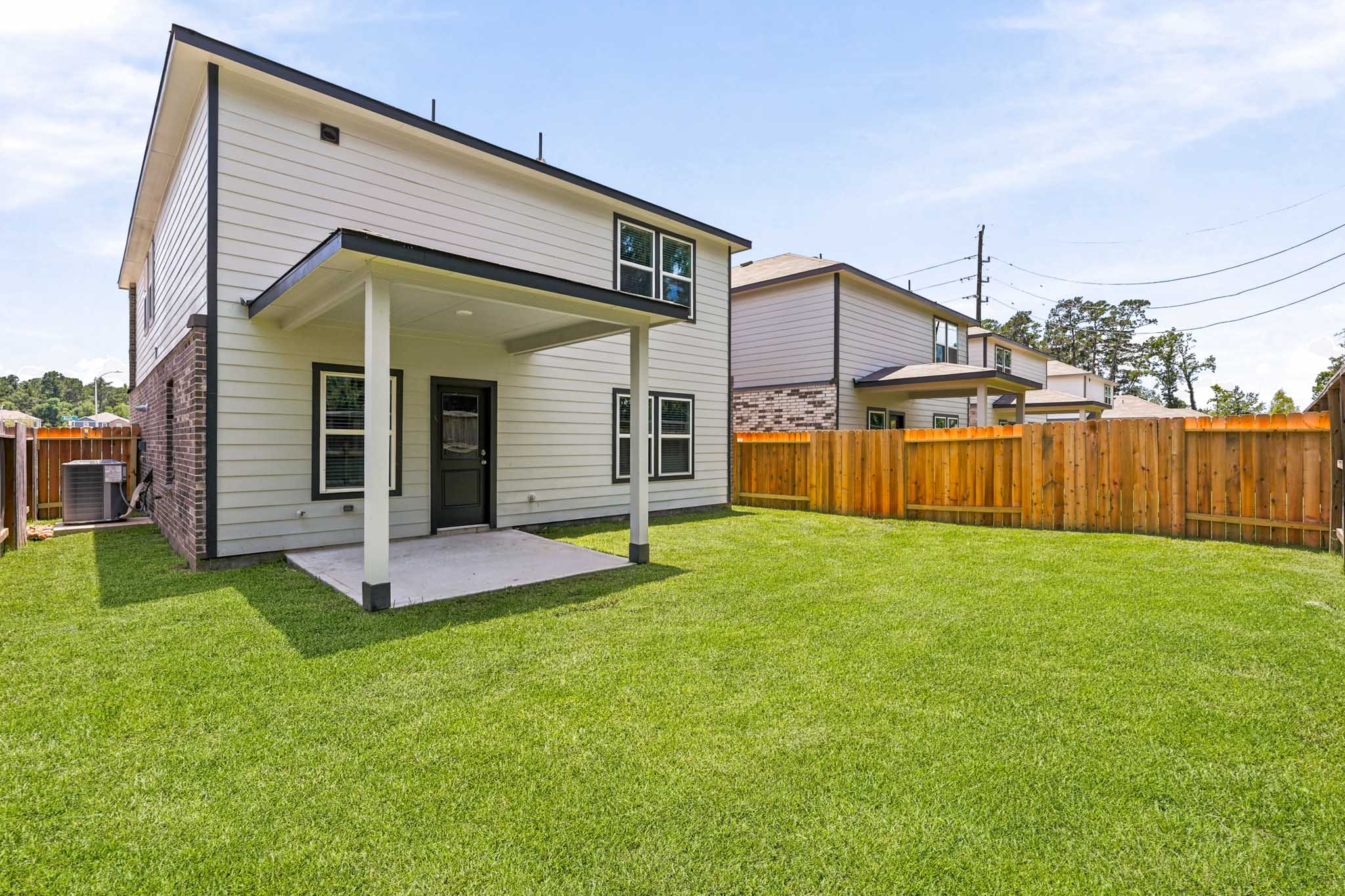 A house with a fence around it.