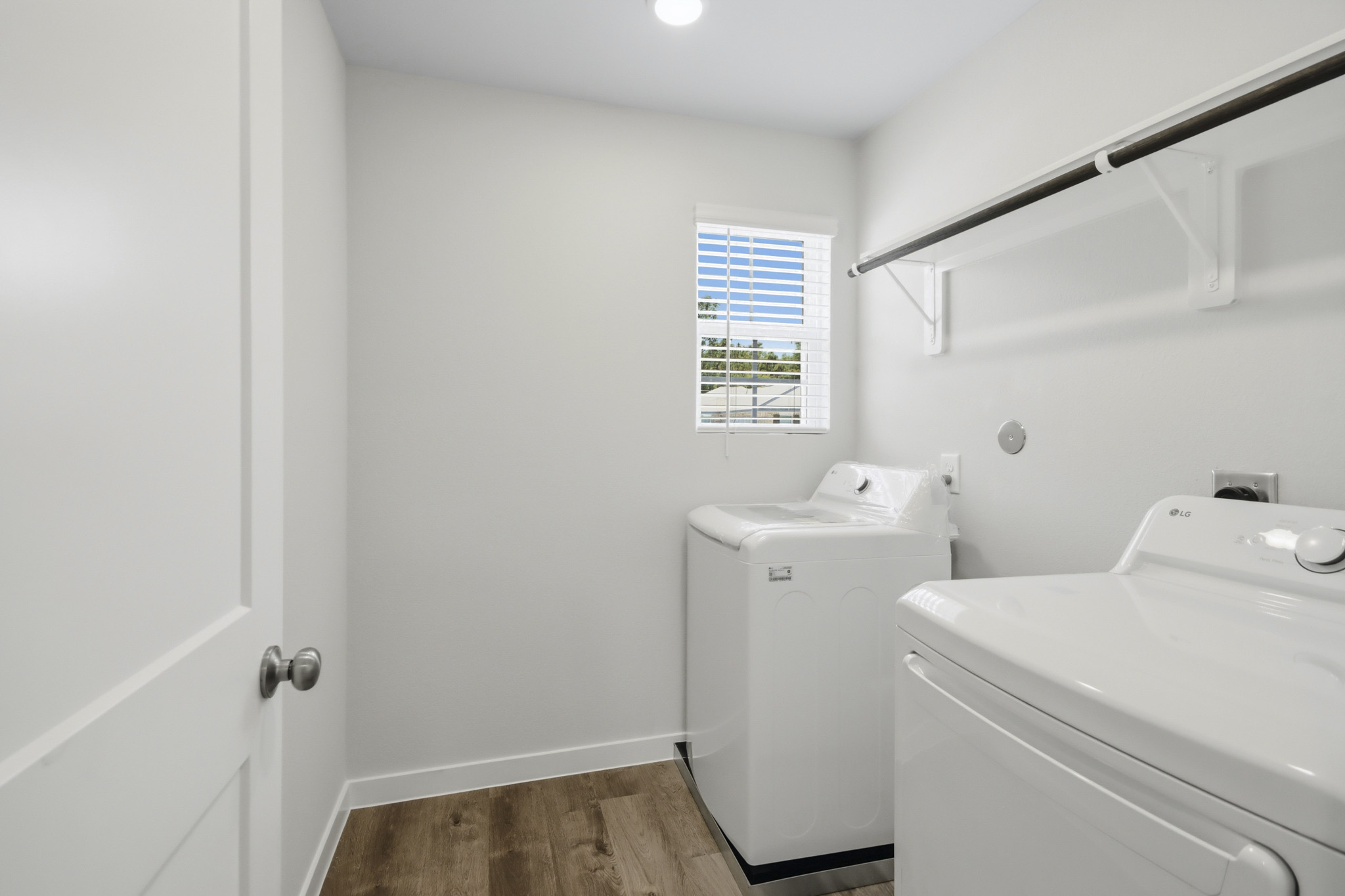 A bathroom with a tub and sink.