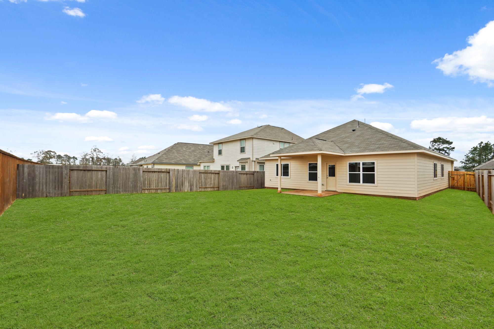 A house with a fence around it.