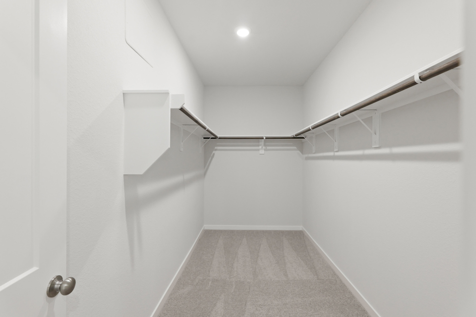 A white hallway with white walls.