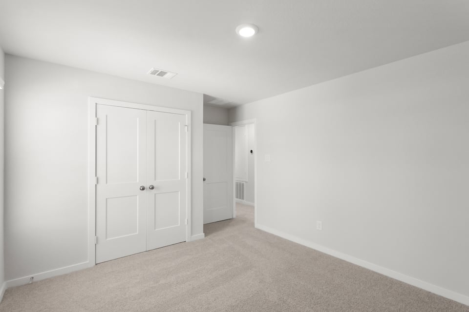 A room with white doors.