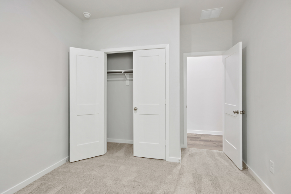 A room with white doors.