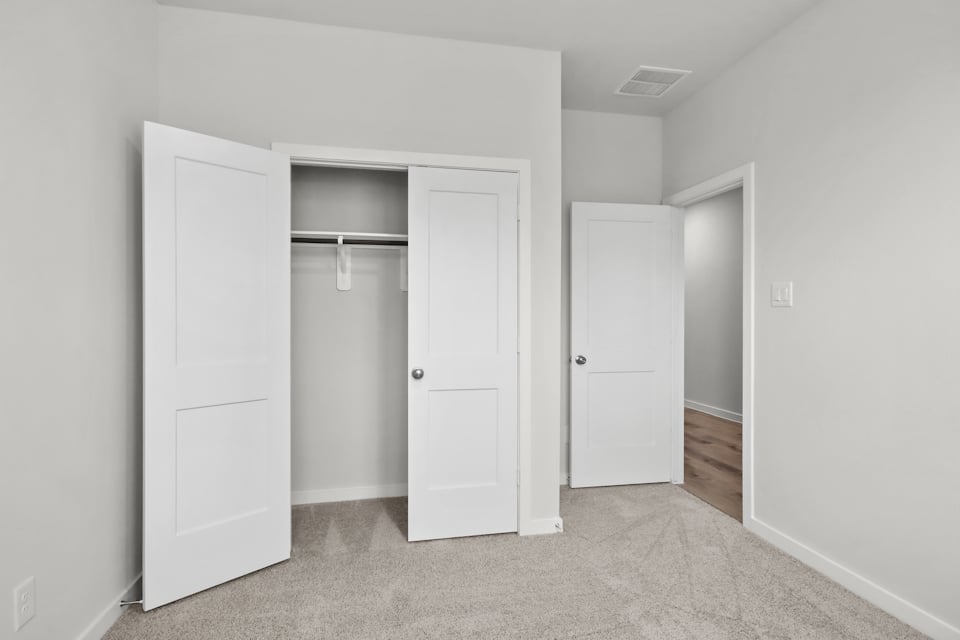 A room with white doors.