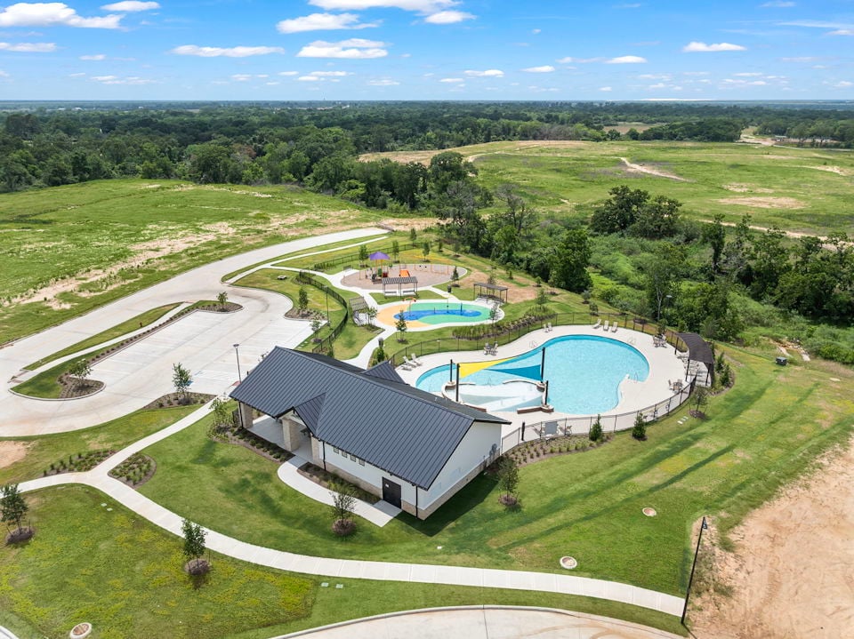 A swimming pool in a golf course.