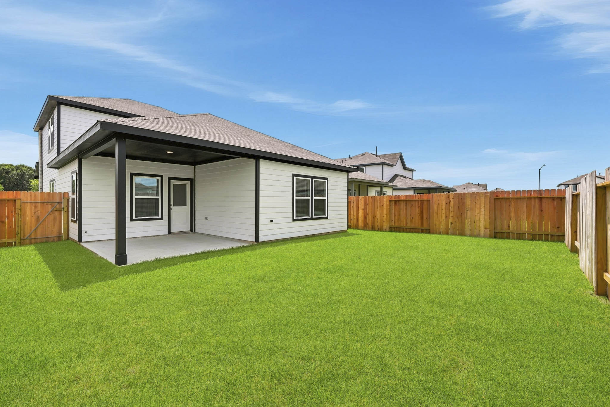 A house with a fence around it.