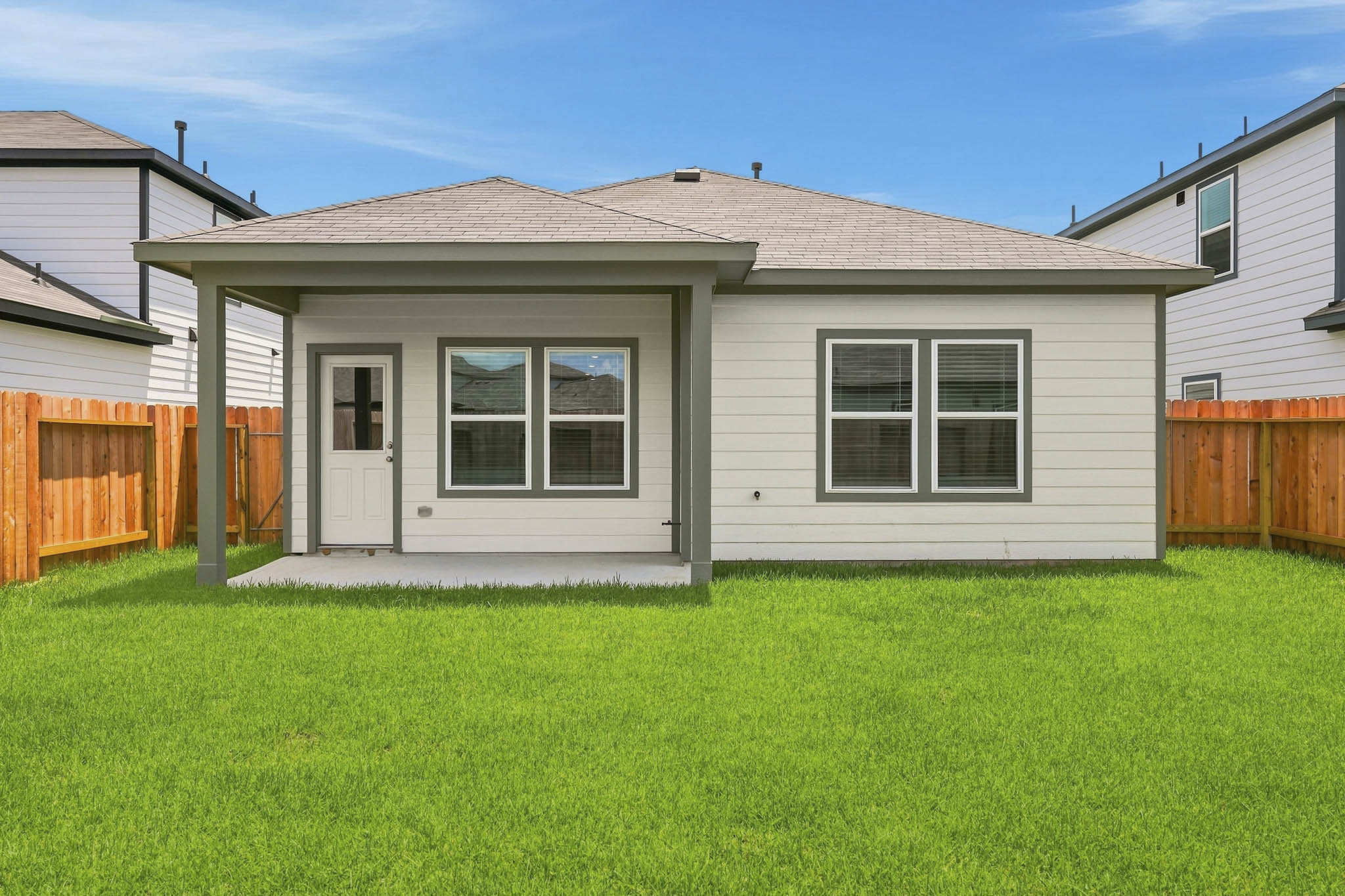 A house with a fence around it.