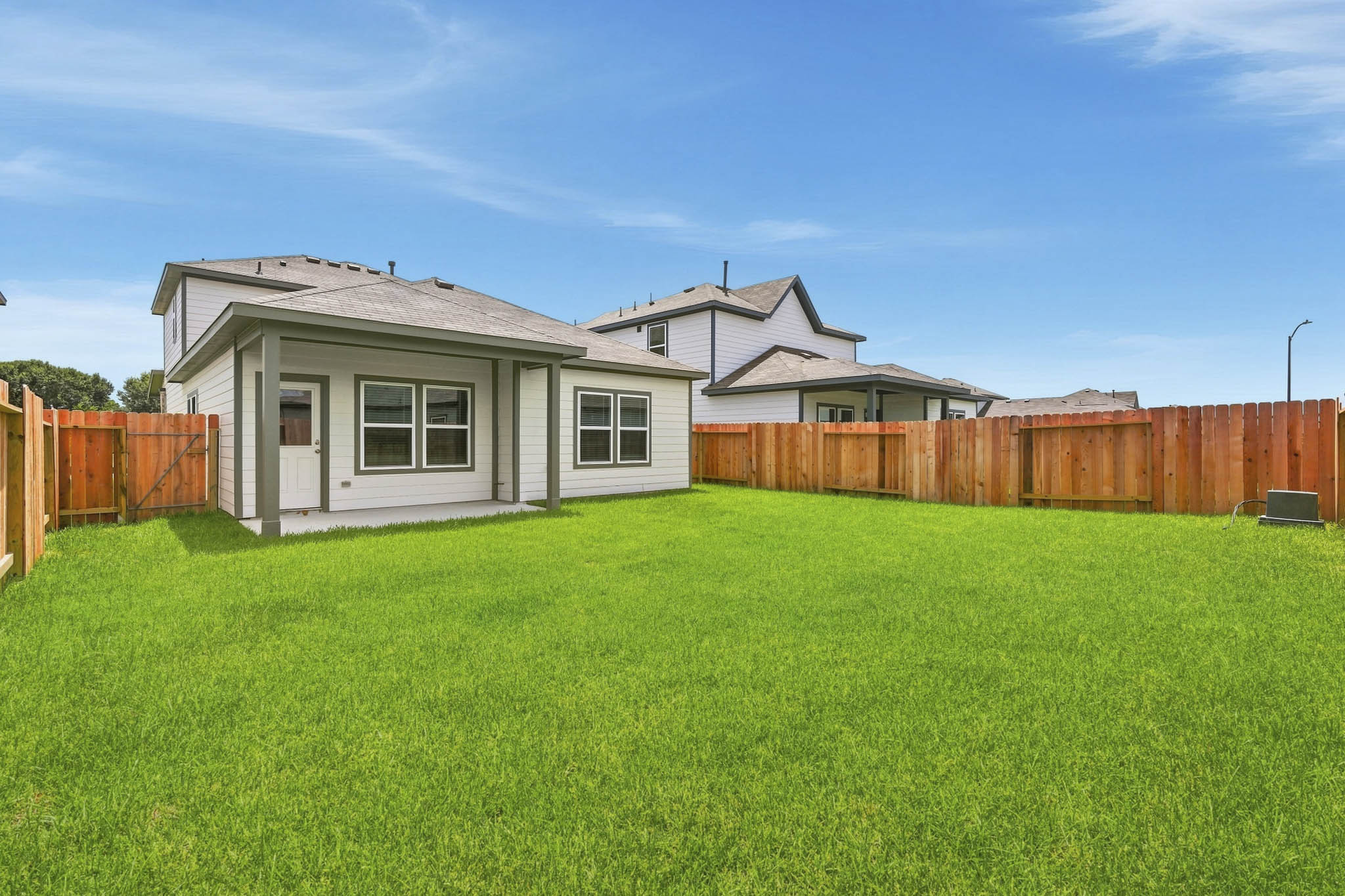 A house with a fence around it.