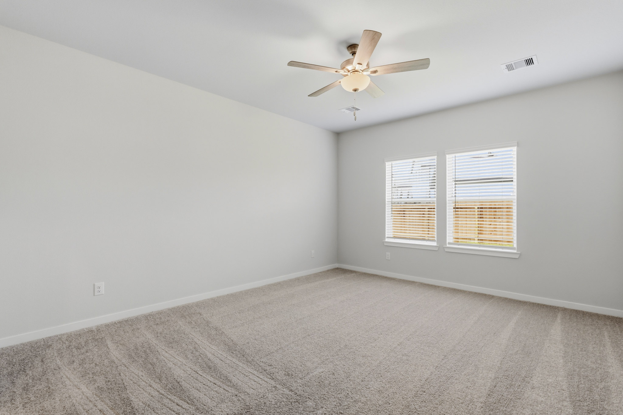 A ceiling fan in a room.