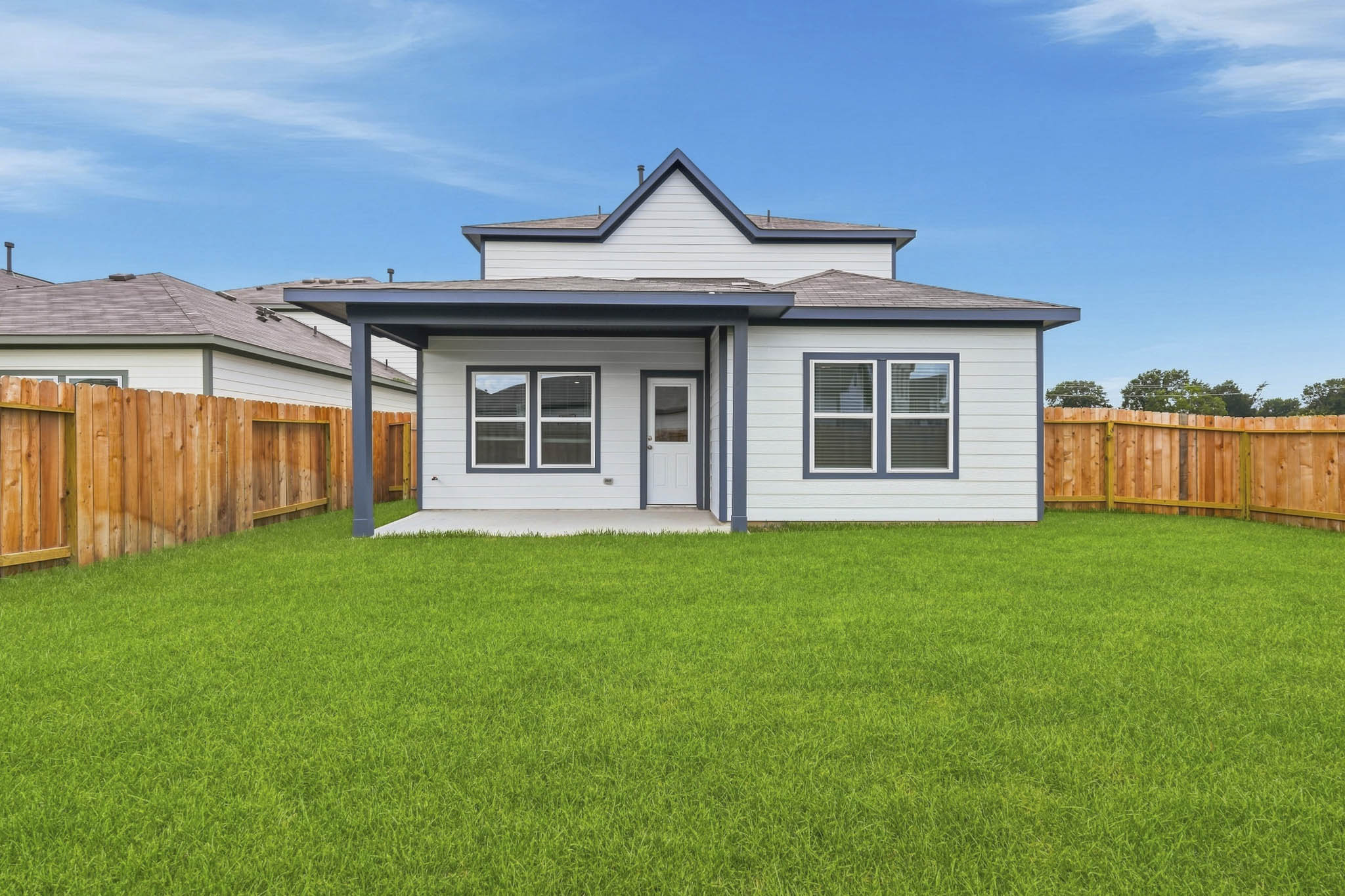 A house with a fence around it.