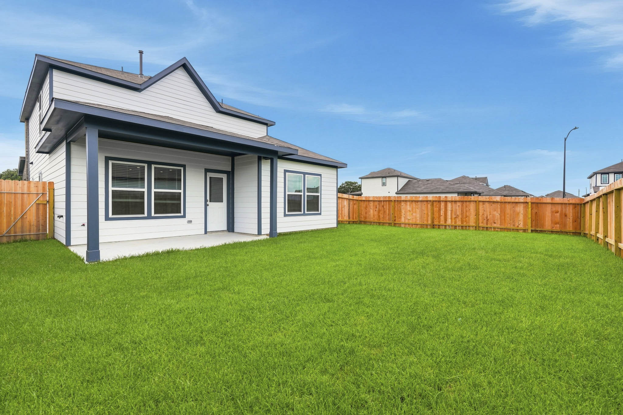 A house with a fence around it.