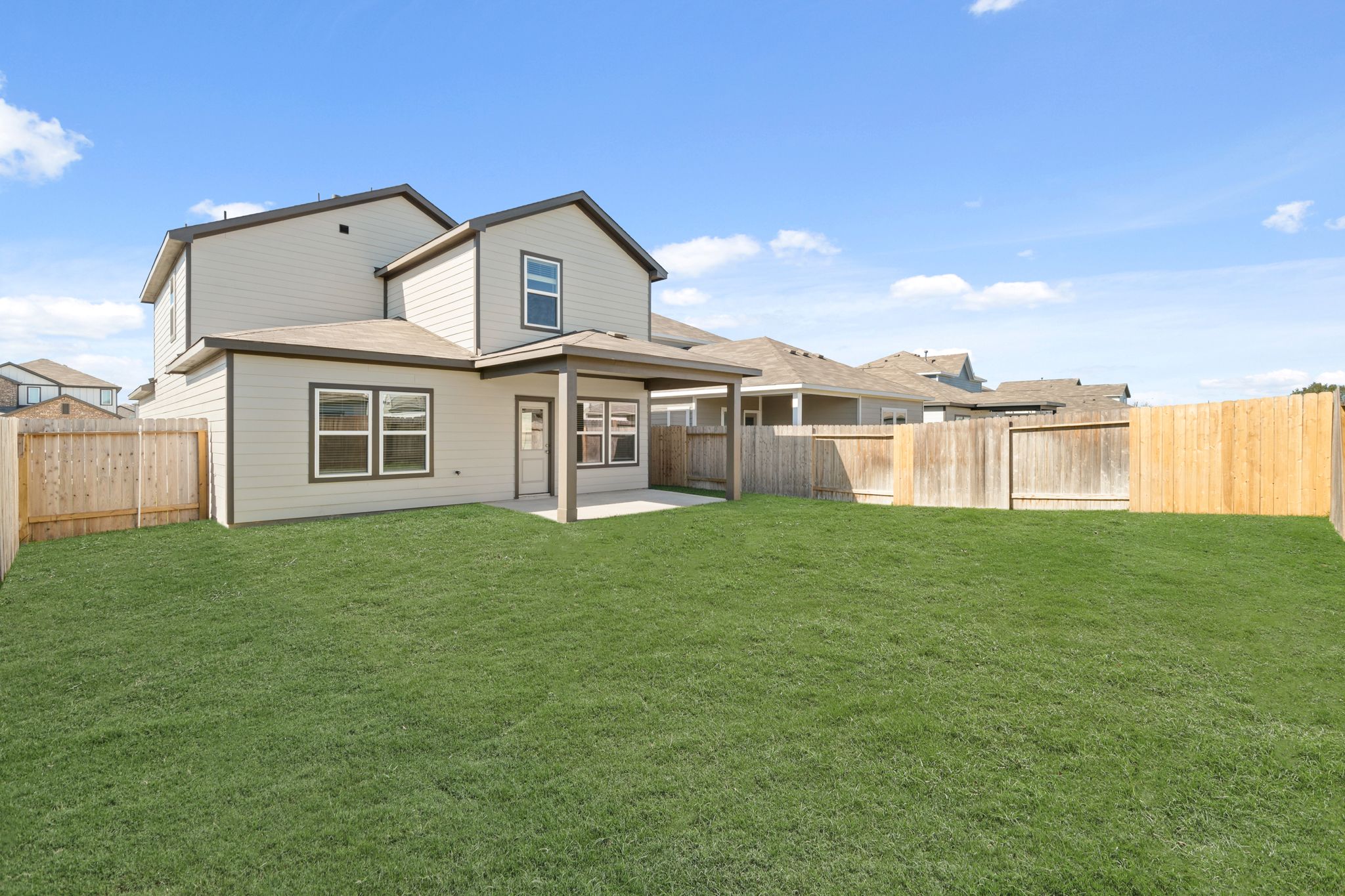 A house with a fence around it.