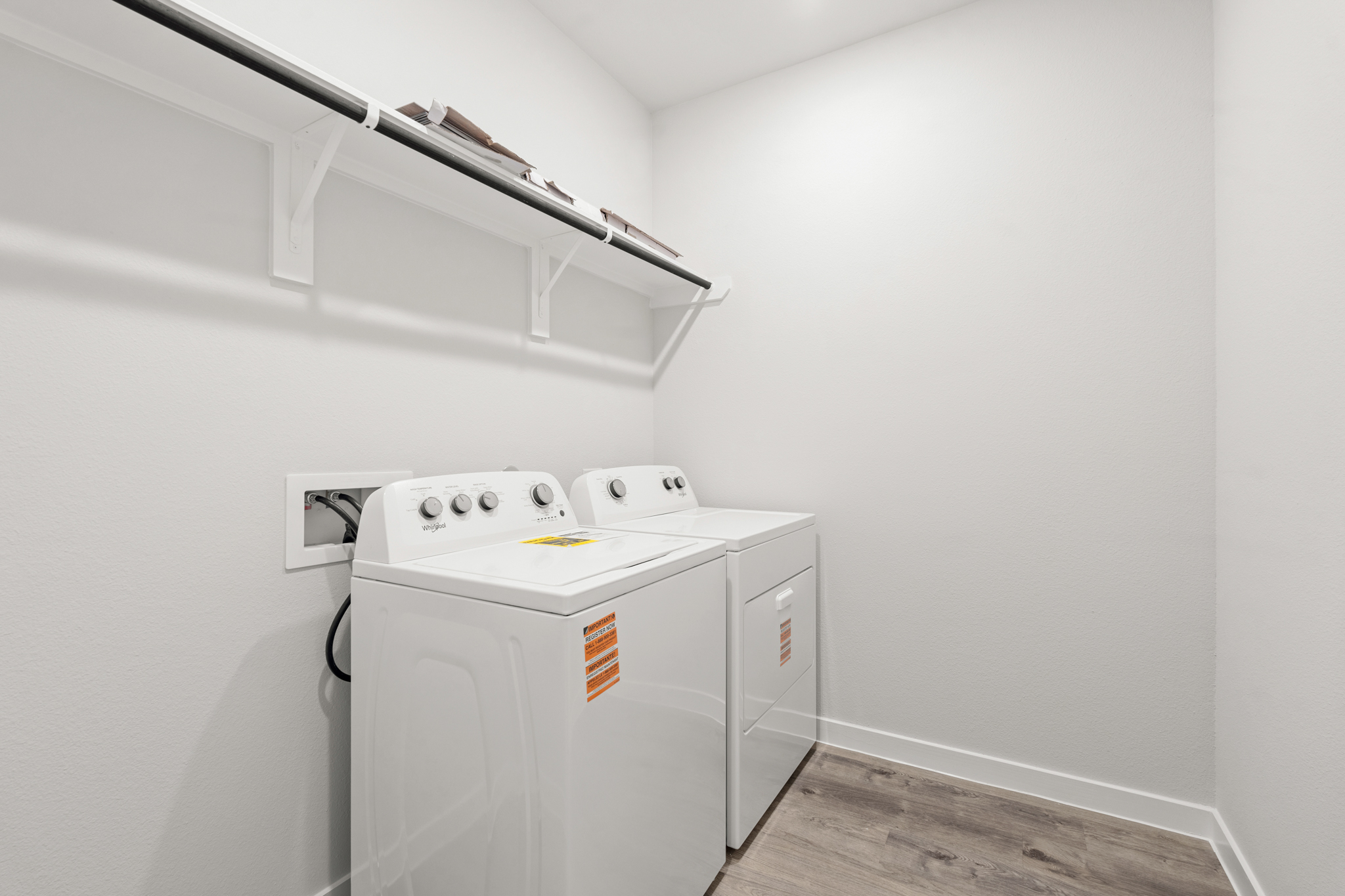 A washing machine in a room.