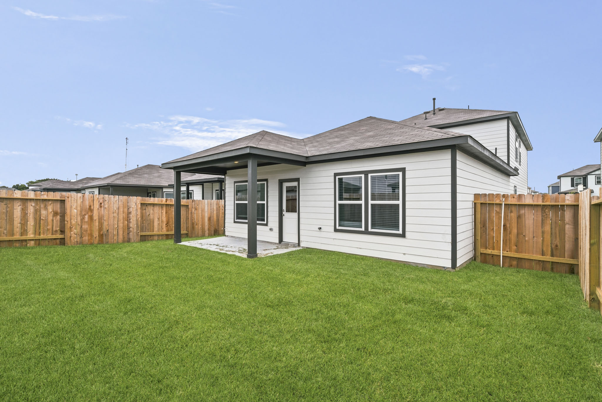 A house with a fence around it.