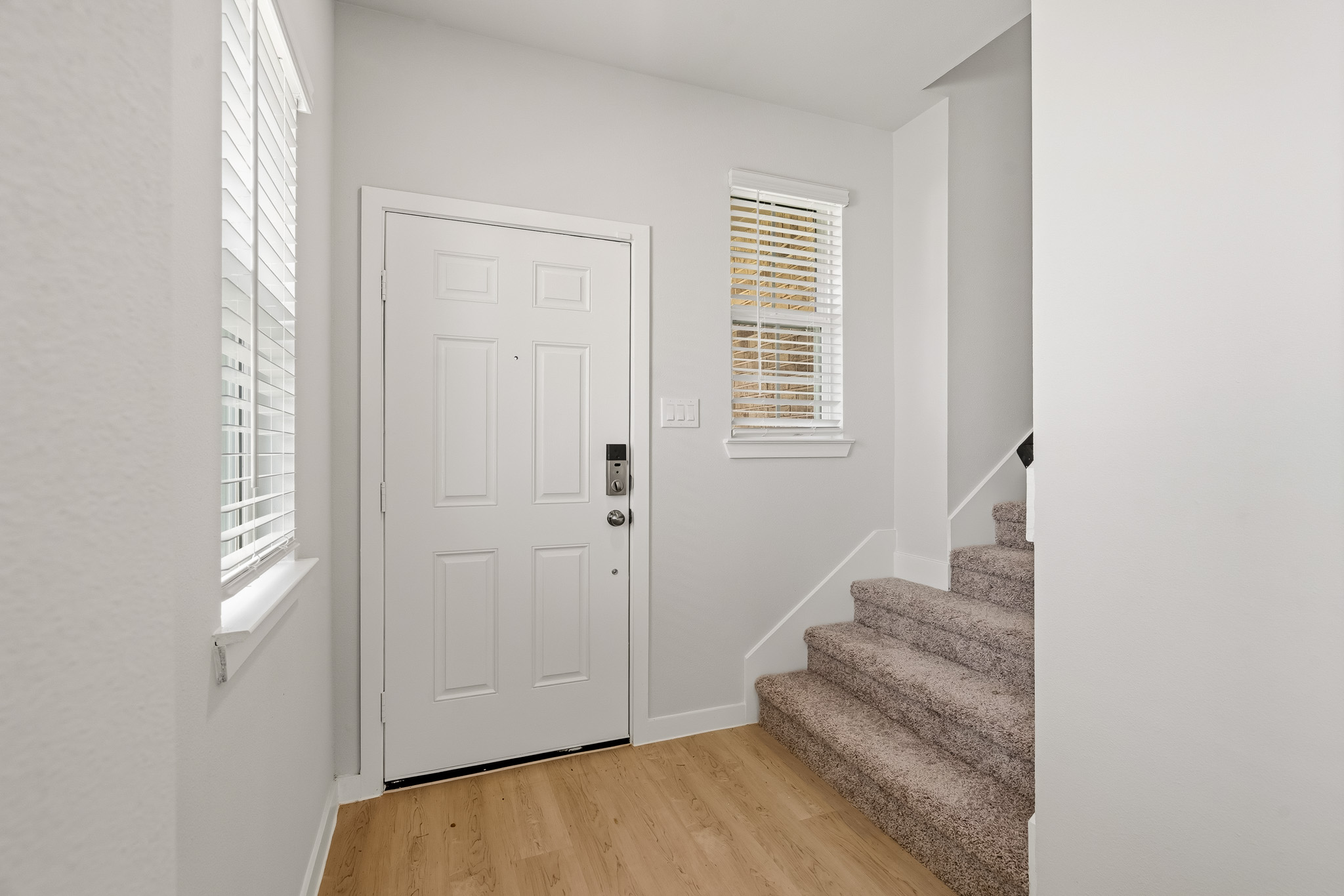 A white door in a room.