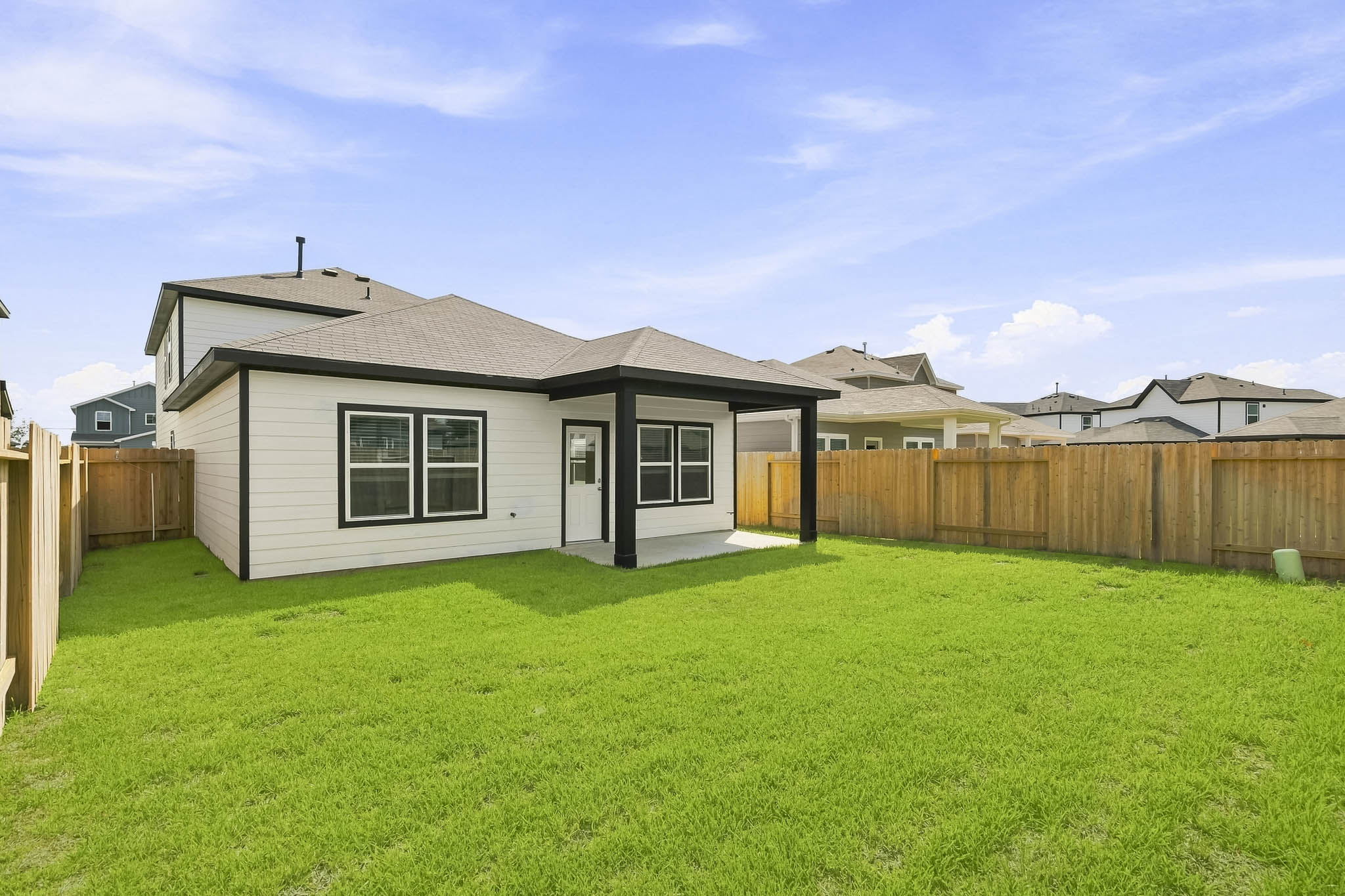 A house with a fence around it.