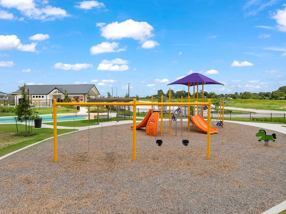 A playground with a slide and a slide.