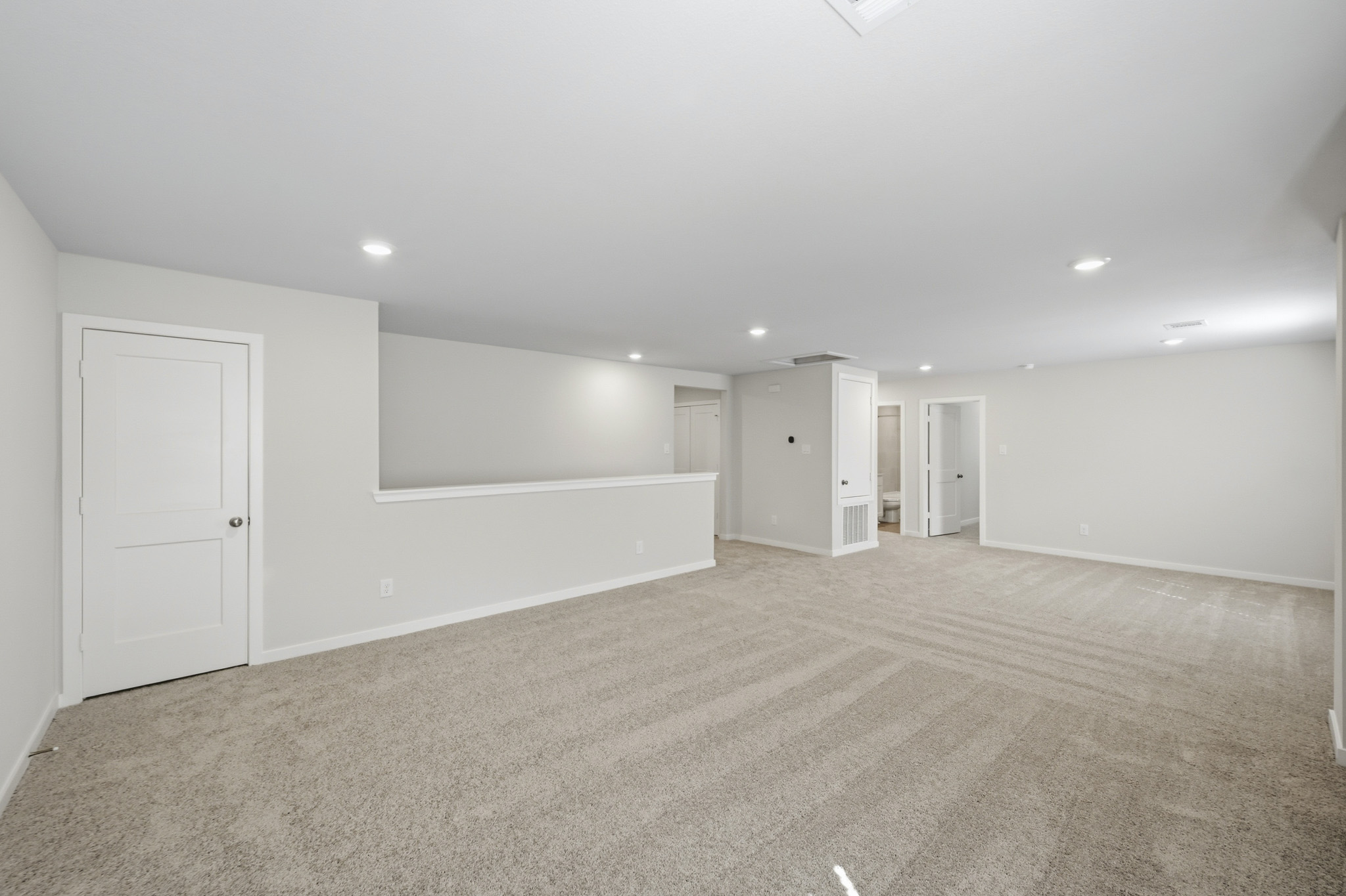 A room with white doors.