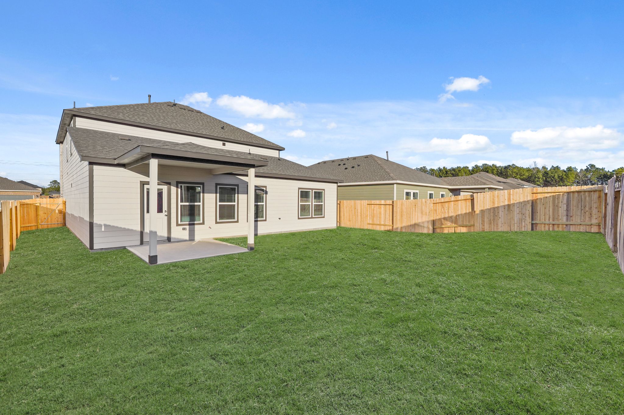 A house with a fence around it.