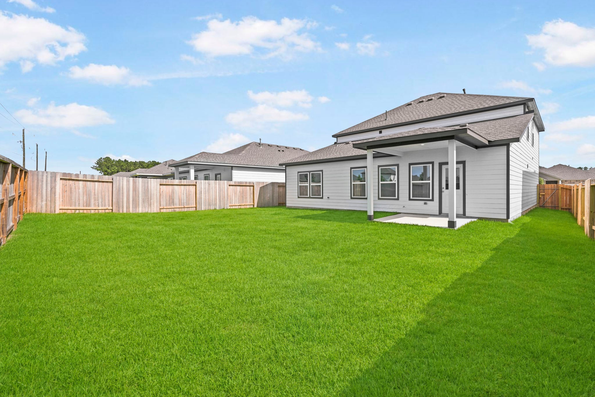 A house with a fence around it.