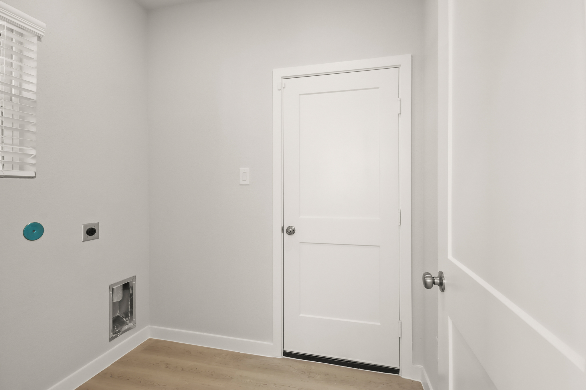 A white door in a room.