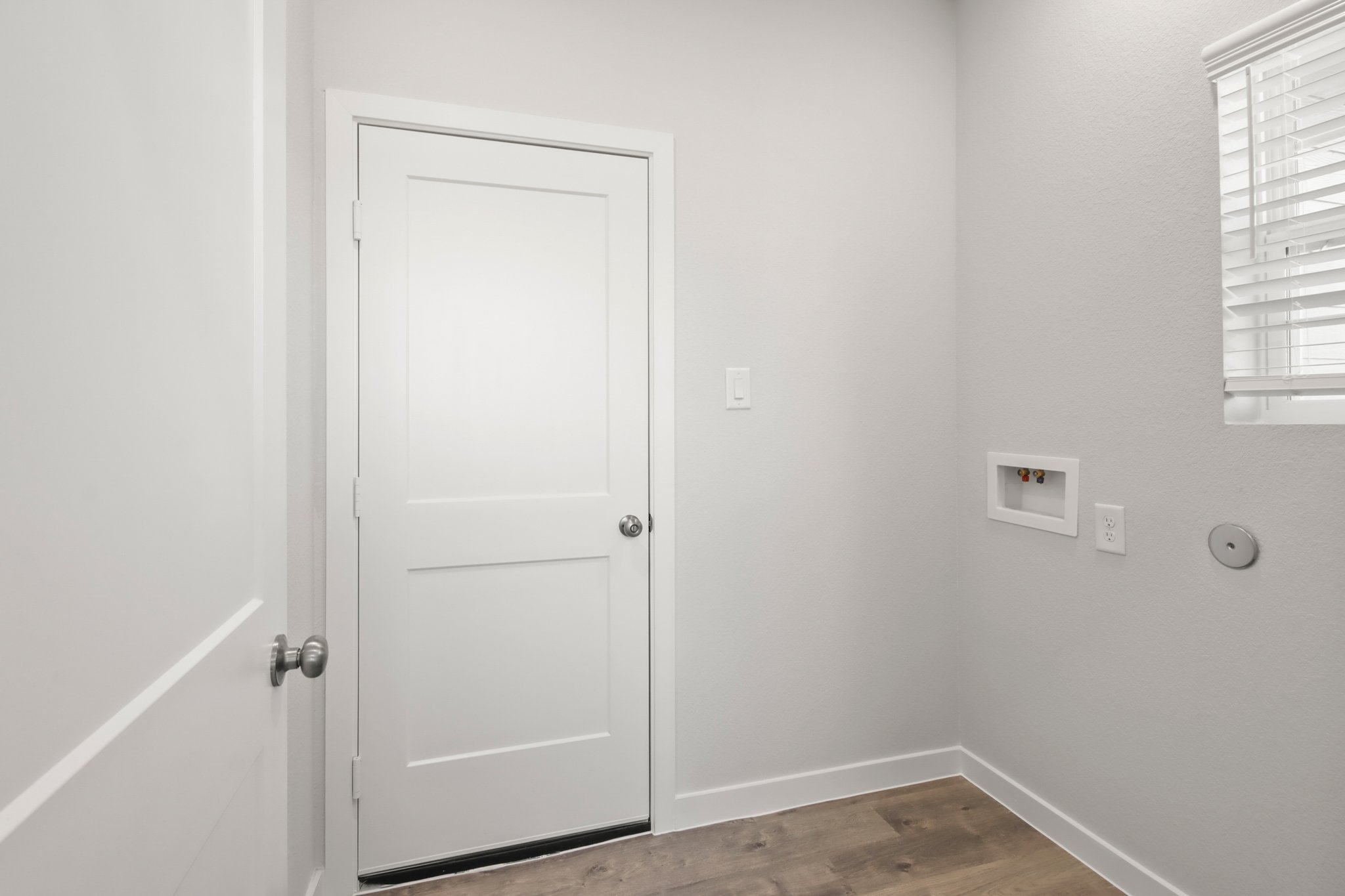 A white door in a room.