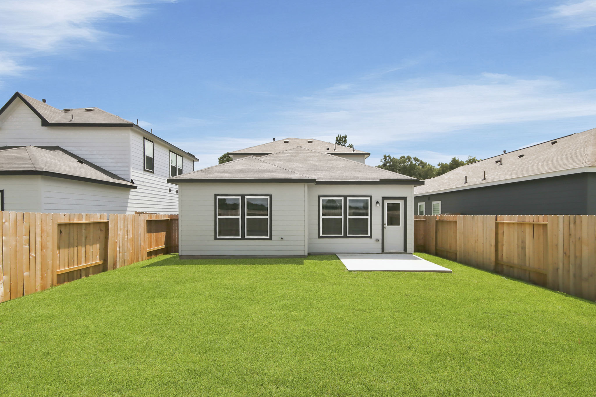 A house with a fence around it.