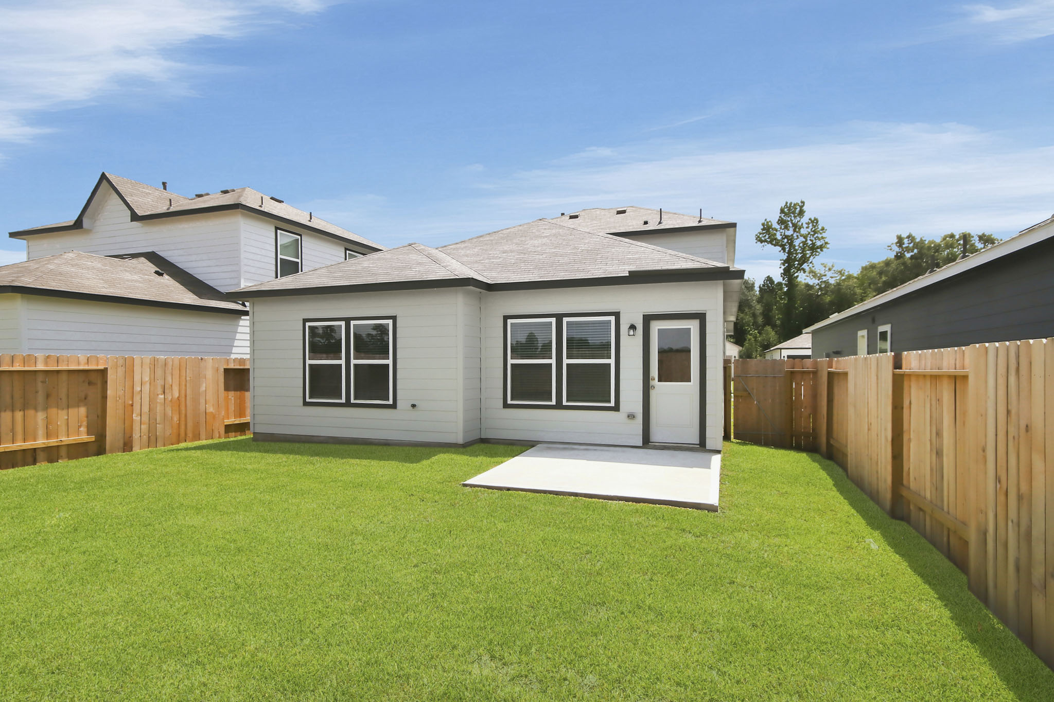 A house with a fence around it.