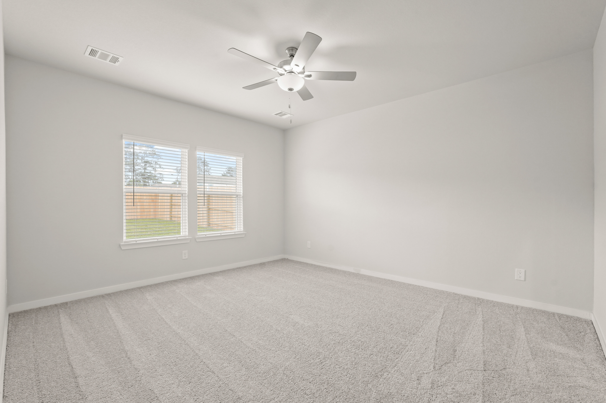 A ceiling fan in a room.