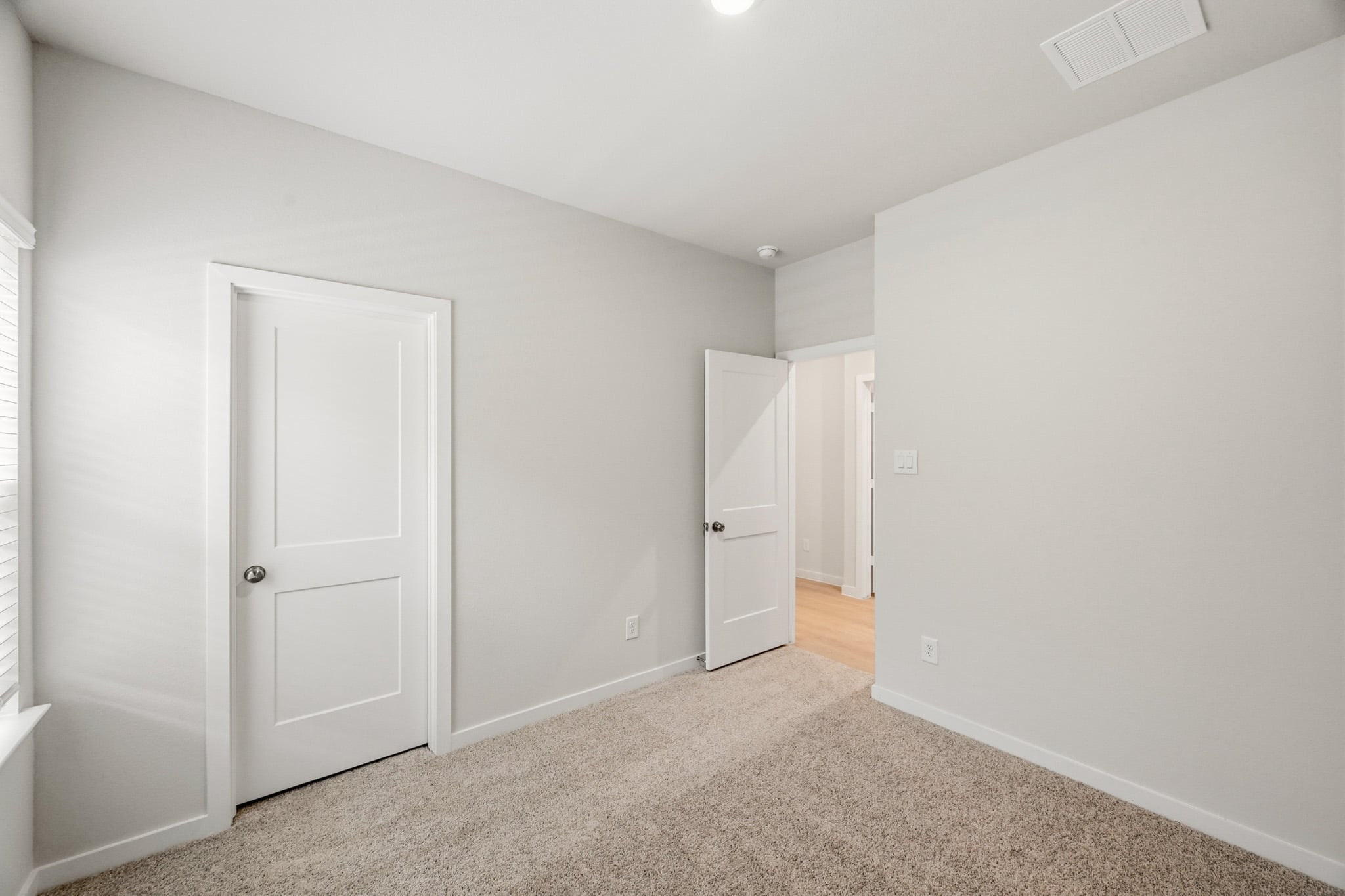 A room with white doors.