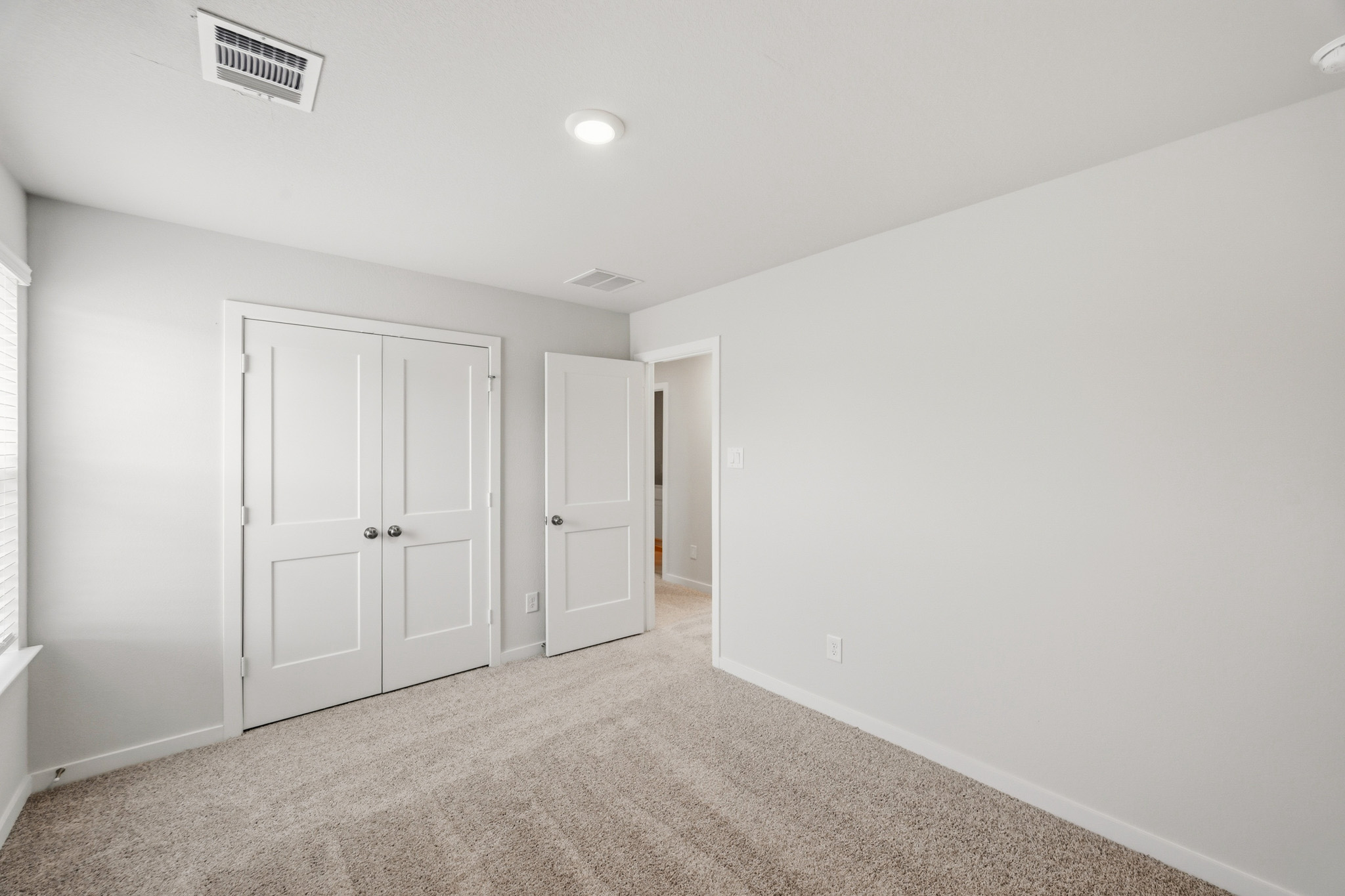 A room with white doors.