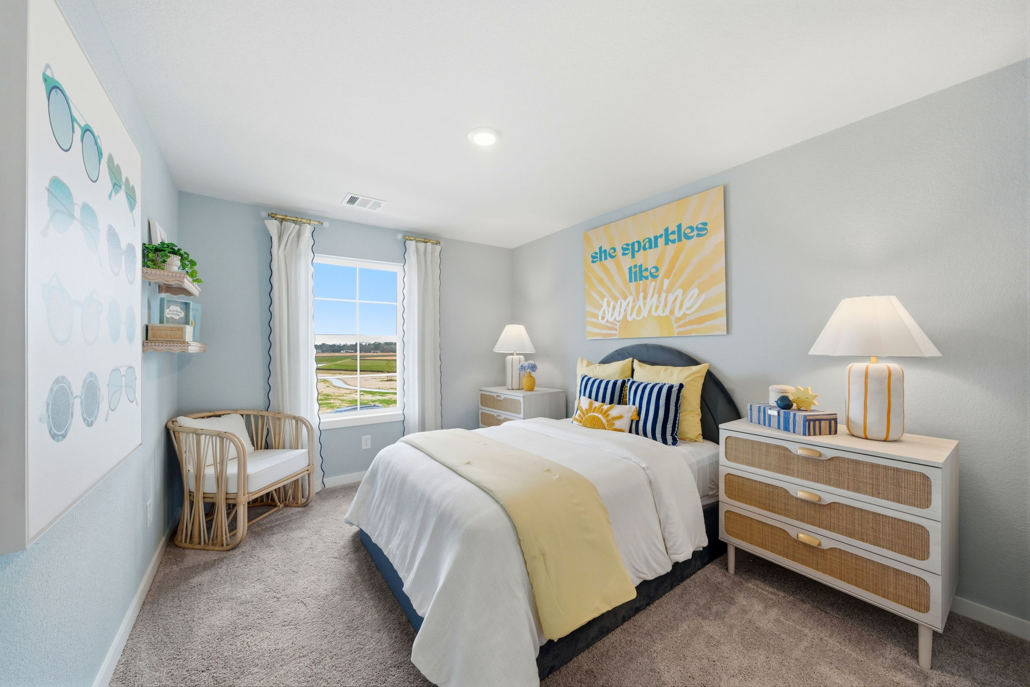 A bedroom with a bed and a table.