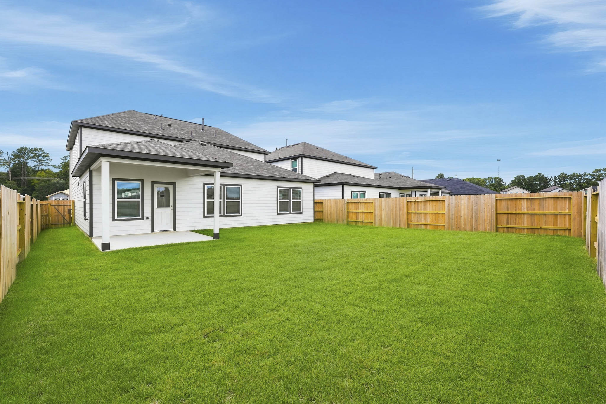 A house with a fence around it.