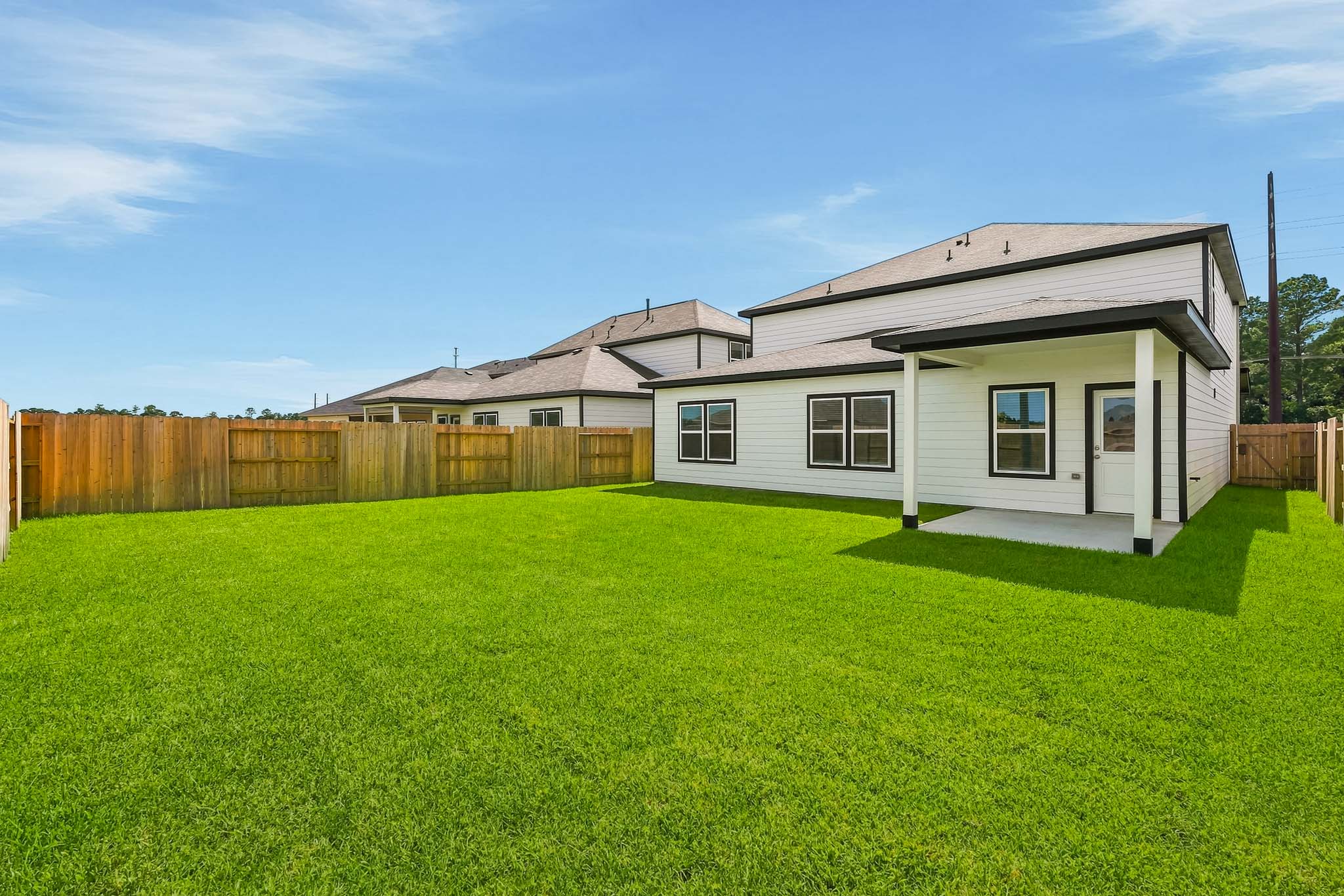 A house with a fence around it.
