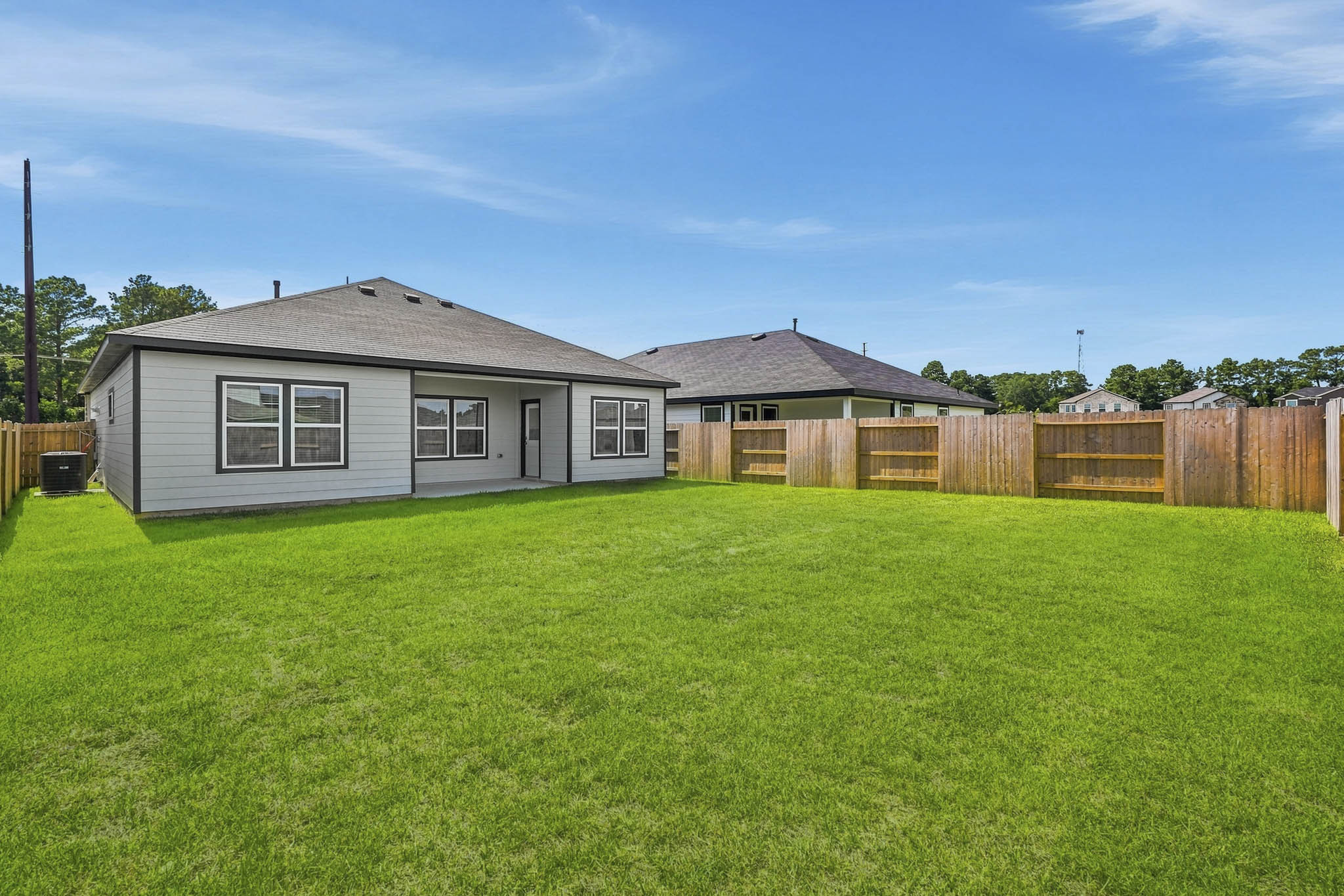 A house with a fence around it.