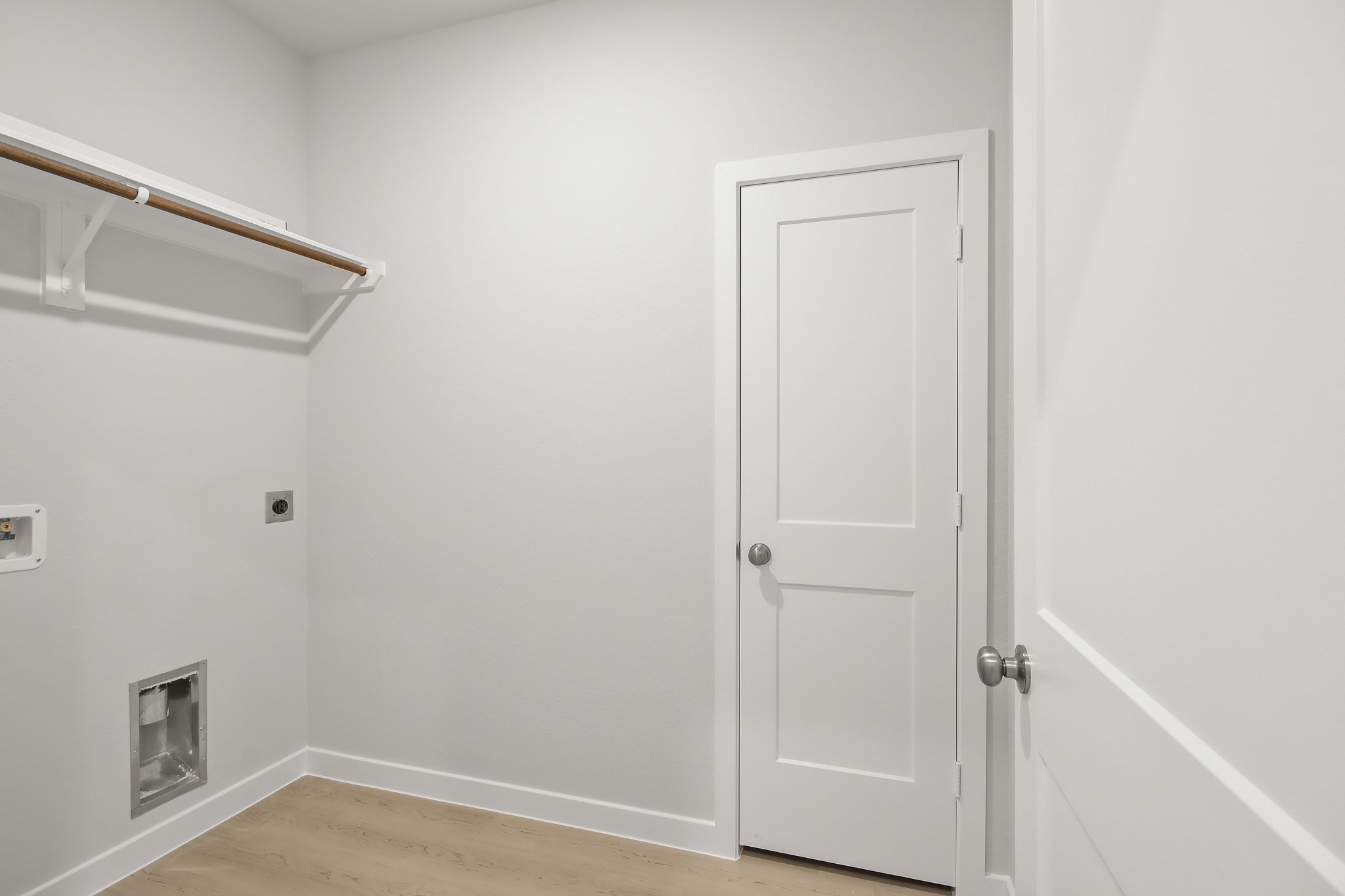 A white door in a room.