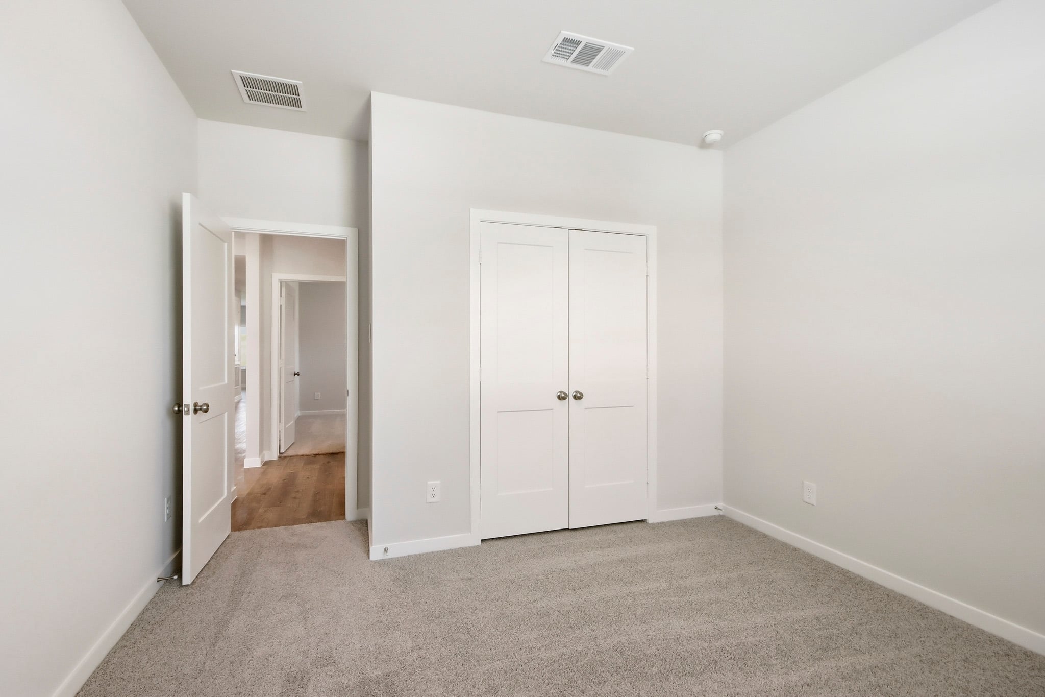 A room with white doors.