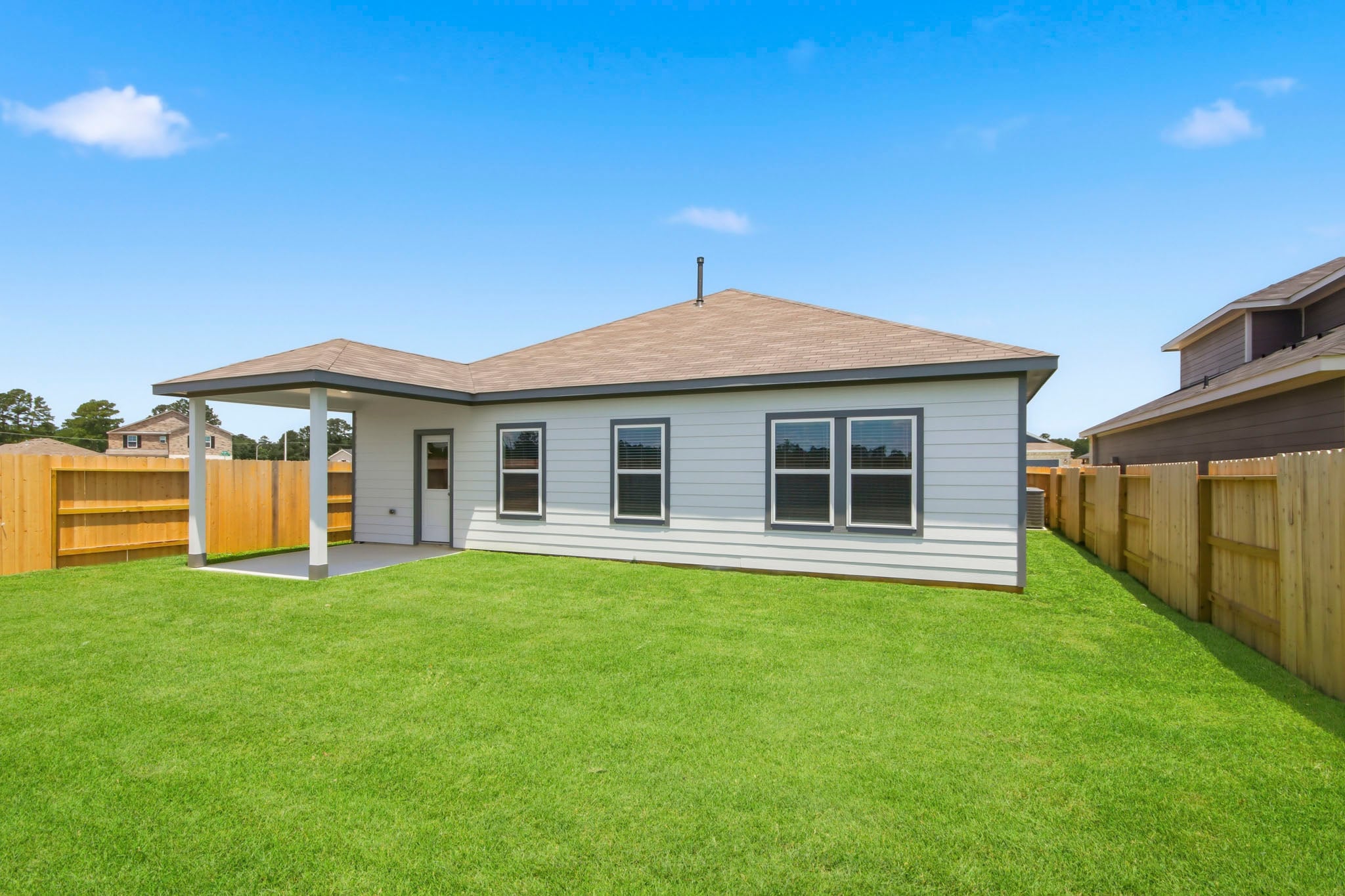 A house with a fence around it.