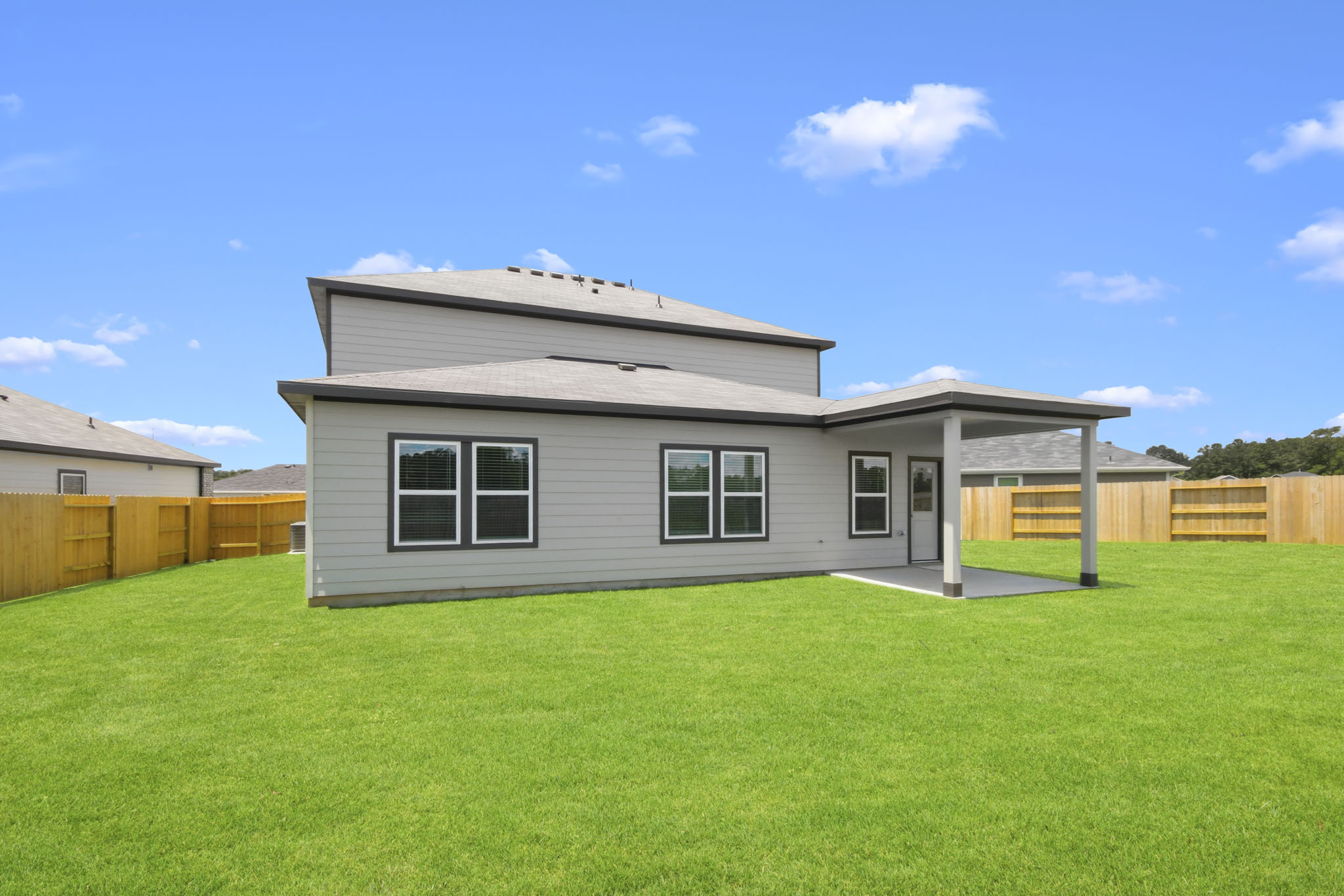 A house with a fence around it.