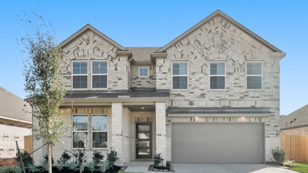 A large house with a garage.