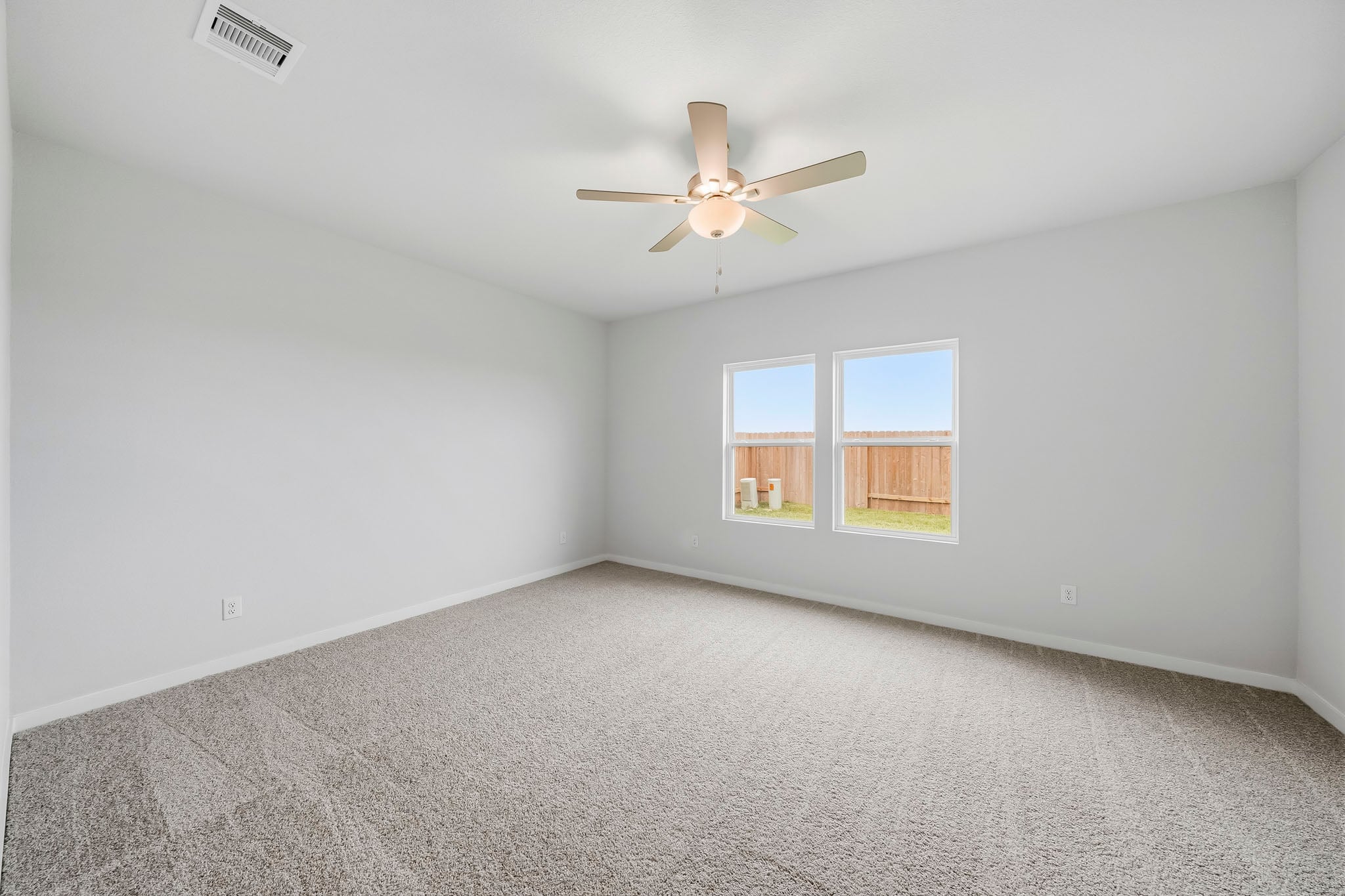 A ceiling fan in a room.